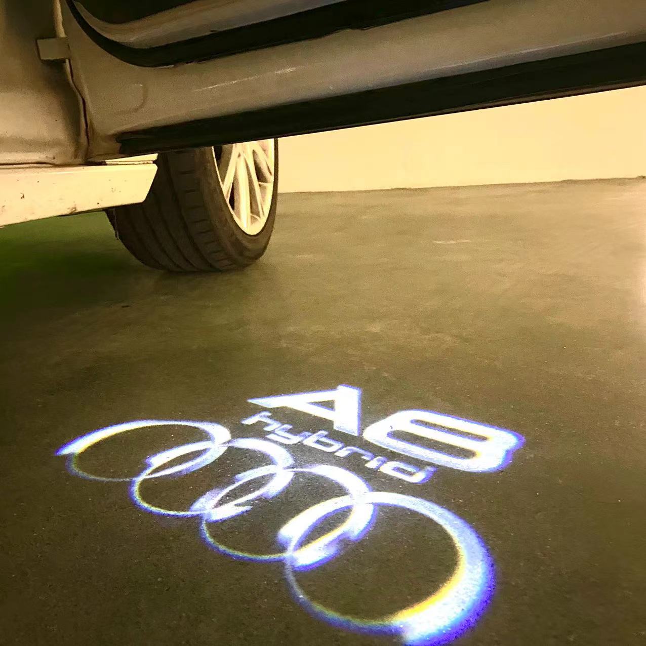 AUDI LOGO PROJECTOT LIGHTS Nr.46 (الكمية 1 = 2 Logo Films /2 أضواء الباب)