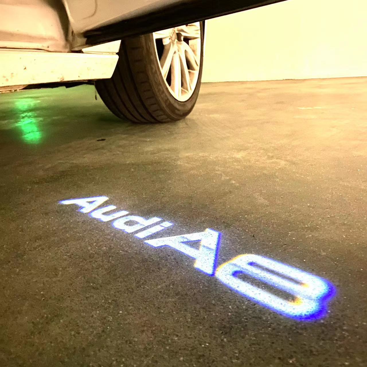 AUDI LOGO PROJECTOT LIGHTS Nr.46 (الكمية 1 = 2 Logo Films /2 أضواء الباب)