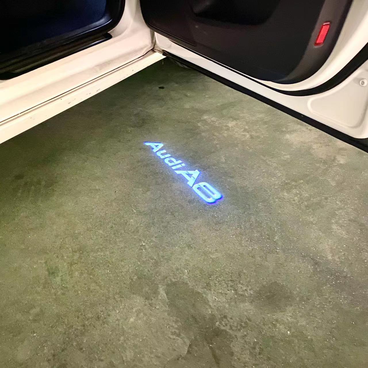 AUDI LOGO PROJECTOT LIGHTS Nr.46 (الكمية 1 = 2 Logo Films /2 أضواء الباب)