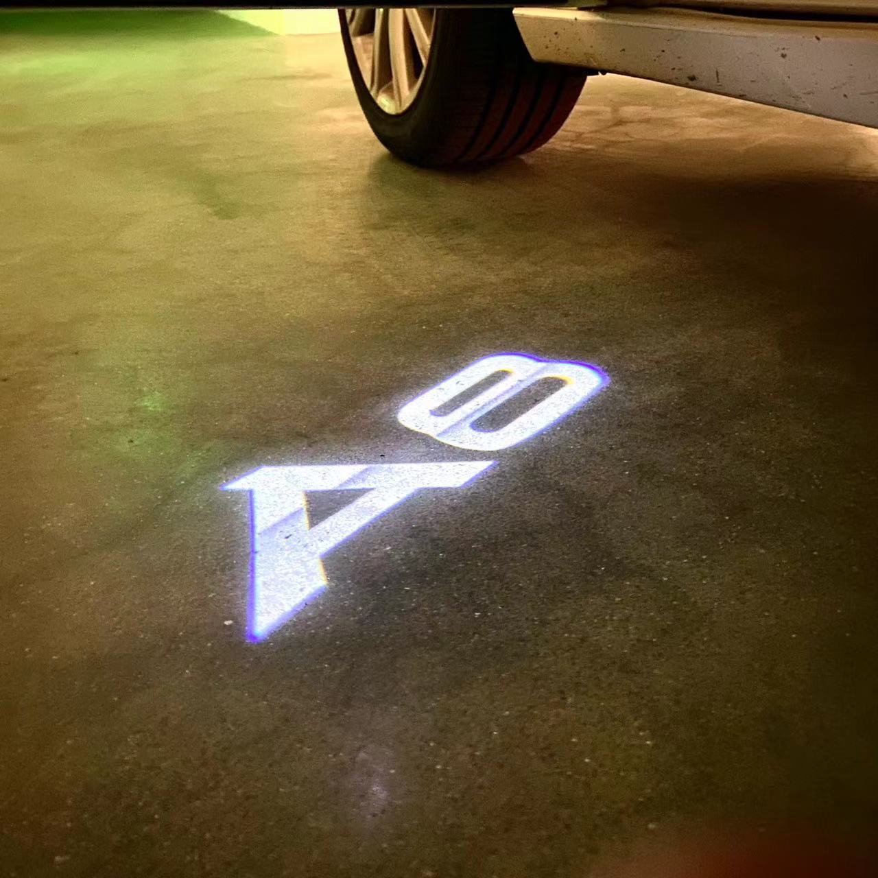 AUDI LOGO PROJECTOT LIGHTS Nr.46 (الكمية 1 = 2 Logo Films /2 أضواء الباب)