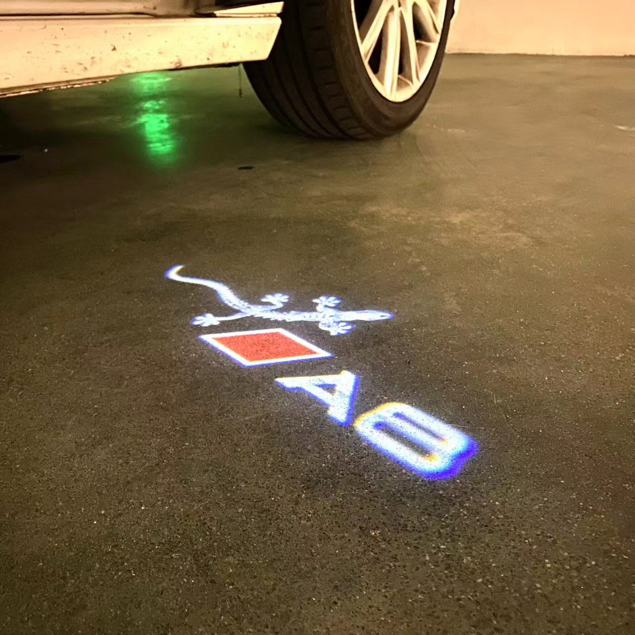 AUDI LOGO PROJECTOT LIGHTS Nr.46 (الكمية 1 = 2 Logo Films /2 أضواء الباب)