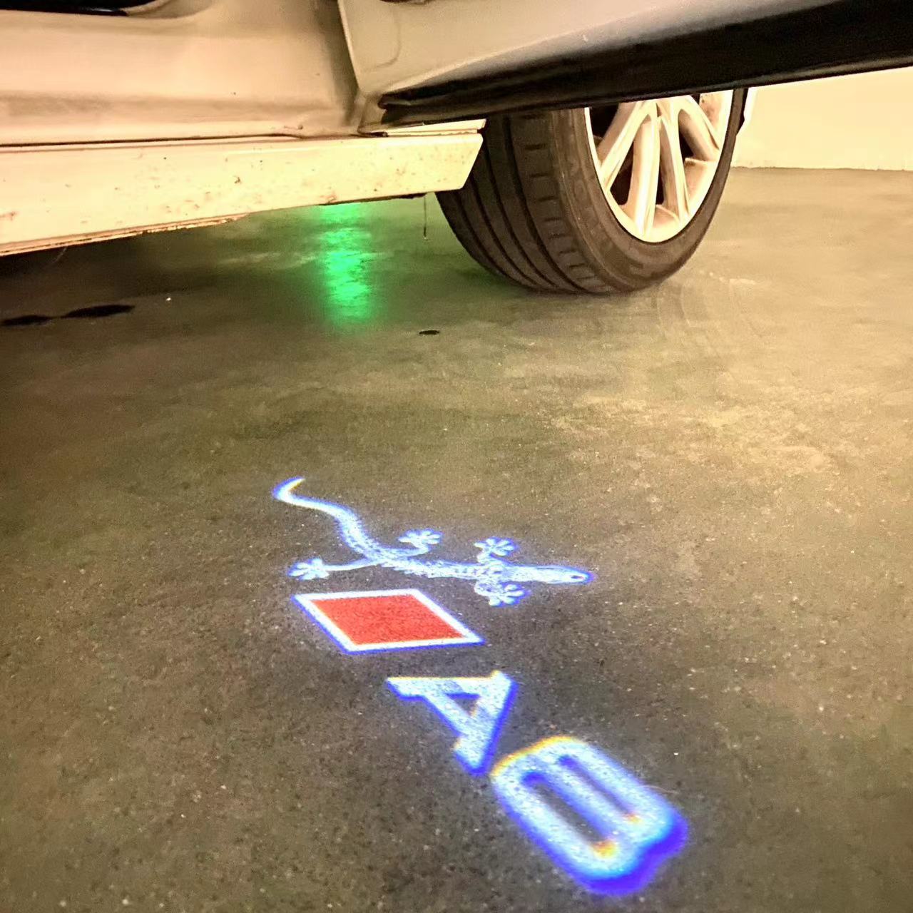 AUDI LOGO PROJECTOT LIGHTS Nr.46 (الكمية 1 = 2 Logo Films /2 أضواء الباب)