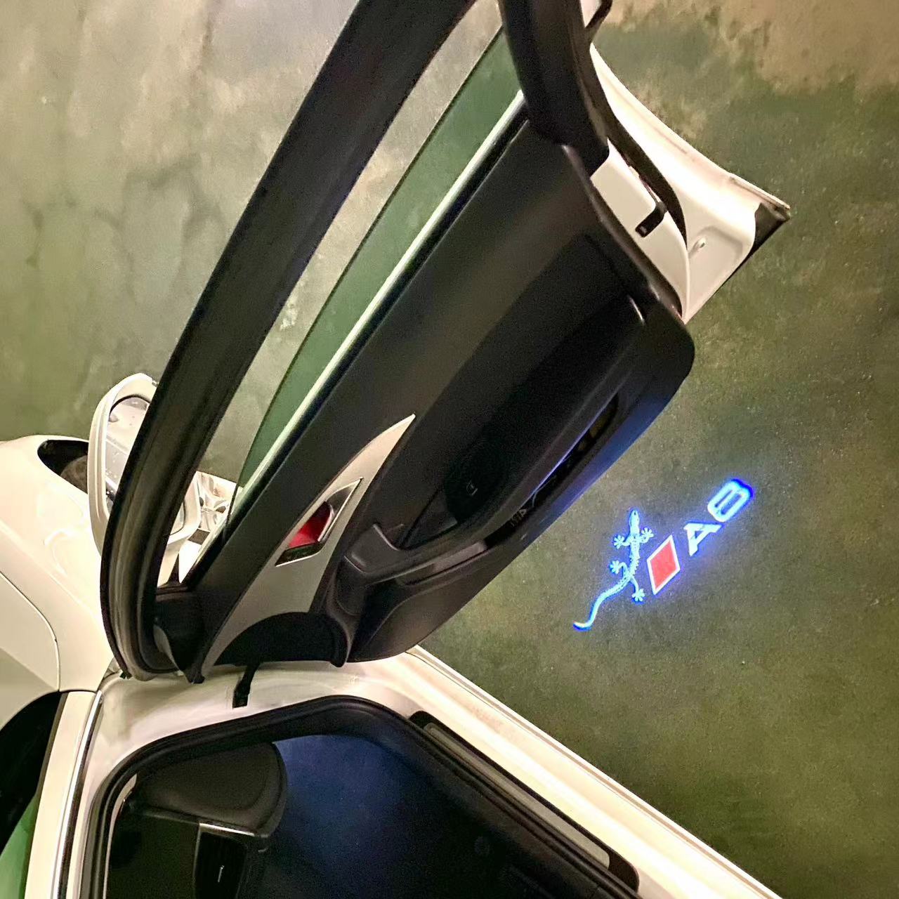 AUDI LOGO PROJECTOT LIGHTS Nr.46 (الكمية 1 = 2 Logo Films /2 أضواء الباب)