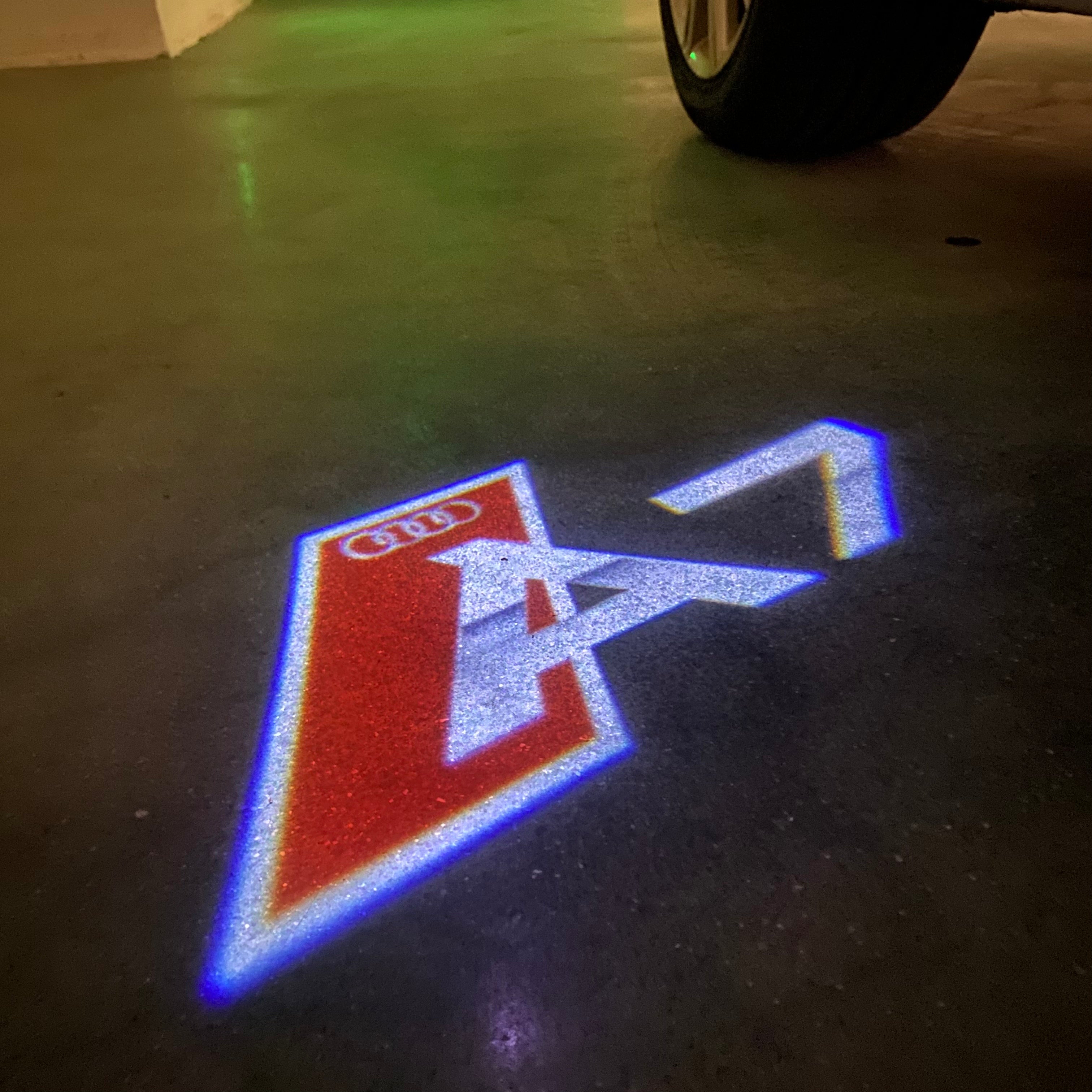 AUDI LOGO PROJECTOT LIGHTS Nr.120 (الكمية 1 = 2 Logo Films /2 أضواء الباب)