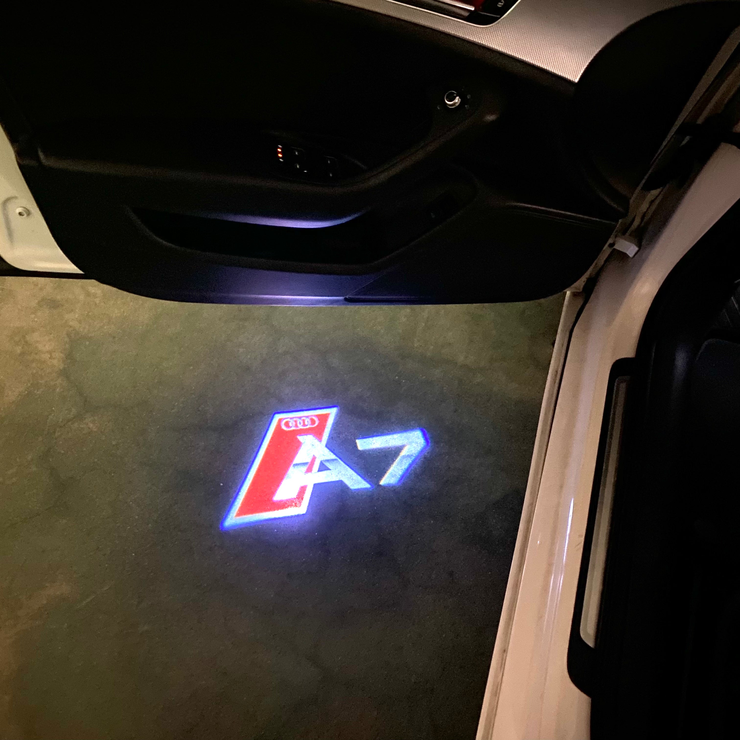 AUDI LOGO PROJECTOT LIGHTS Nr.120 (الكمية 1 = 2 Logo Films /2 أضواء الباب)
