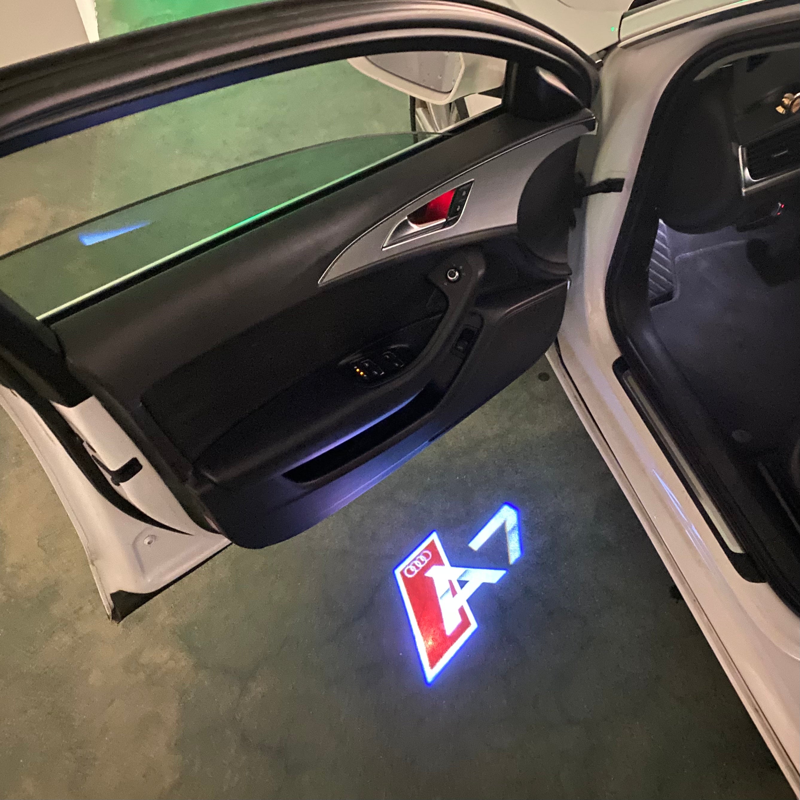 AUDI LOGO PROJECTOT LIGHTS Nr.120 (الكمية 1 = 2 Logo Films /2 أضواء الباب)