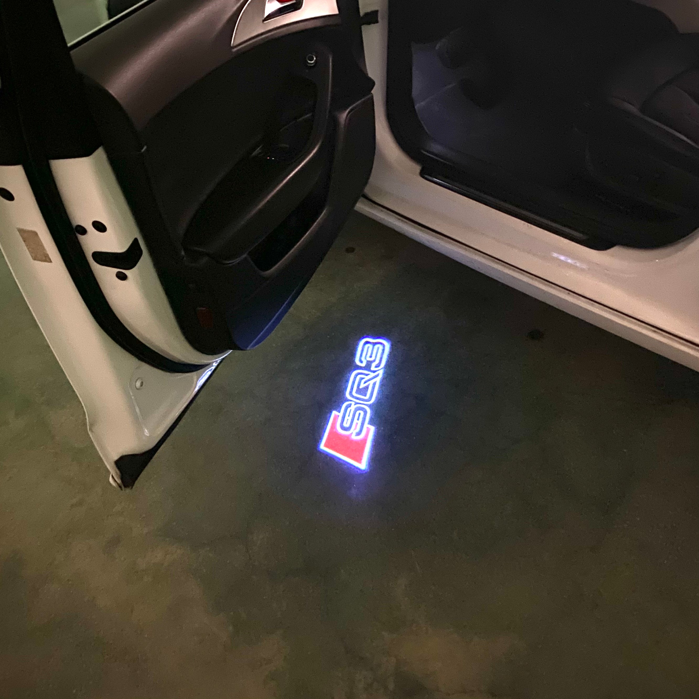 AUDI LOGO PROJECTOT LIGHTS Nr.120 (الكمية 1 = 2 Logo Films /2 أضواء الباب)