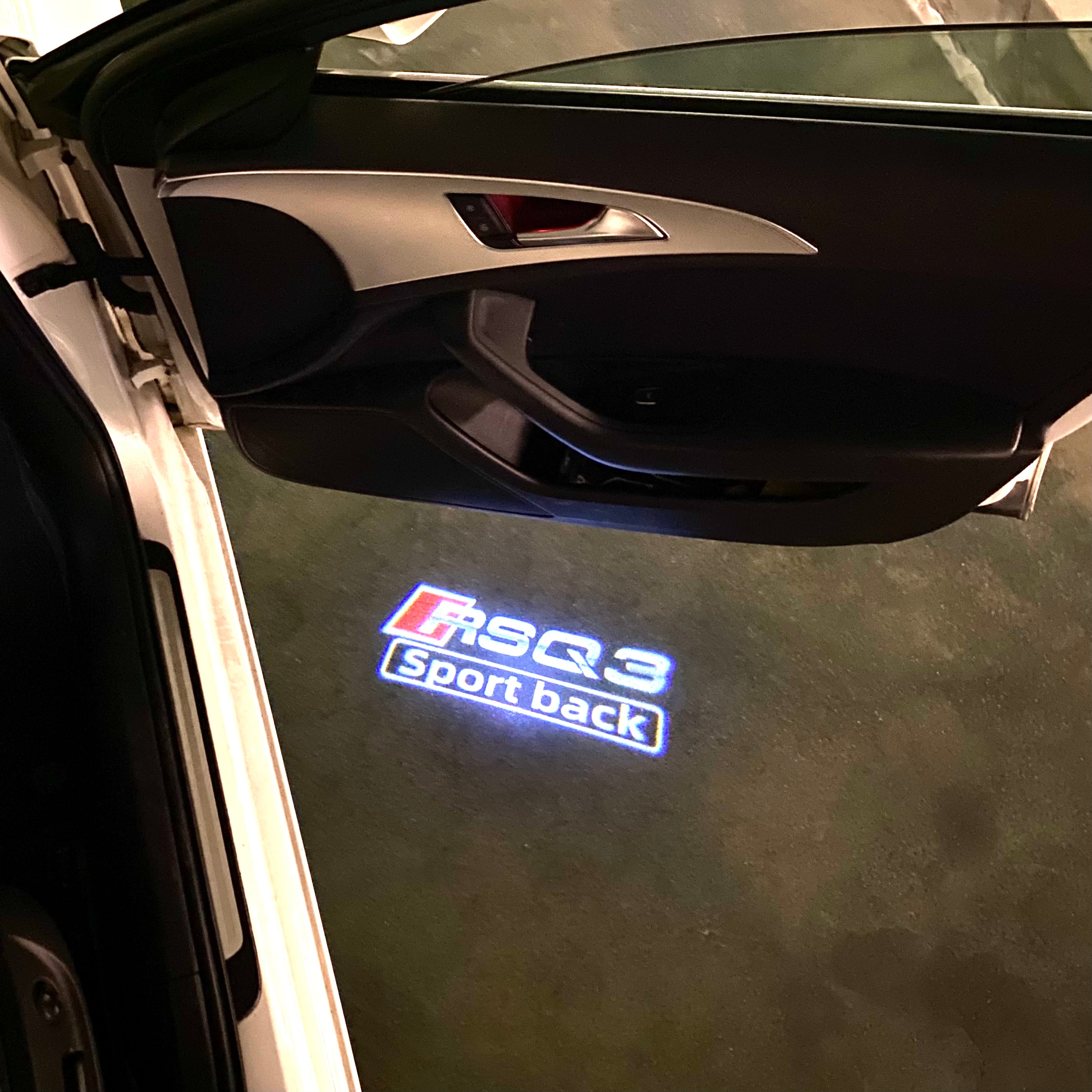 AUDI LOGO PROJECTOT LIGHTS Nr.120 (الكمية 1 = 2 Logo Films /2 أضواء الباب)