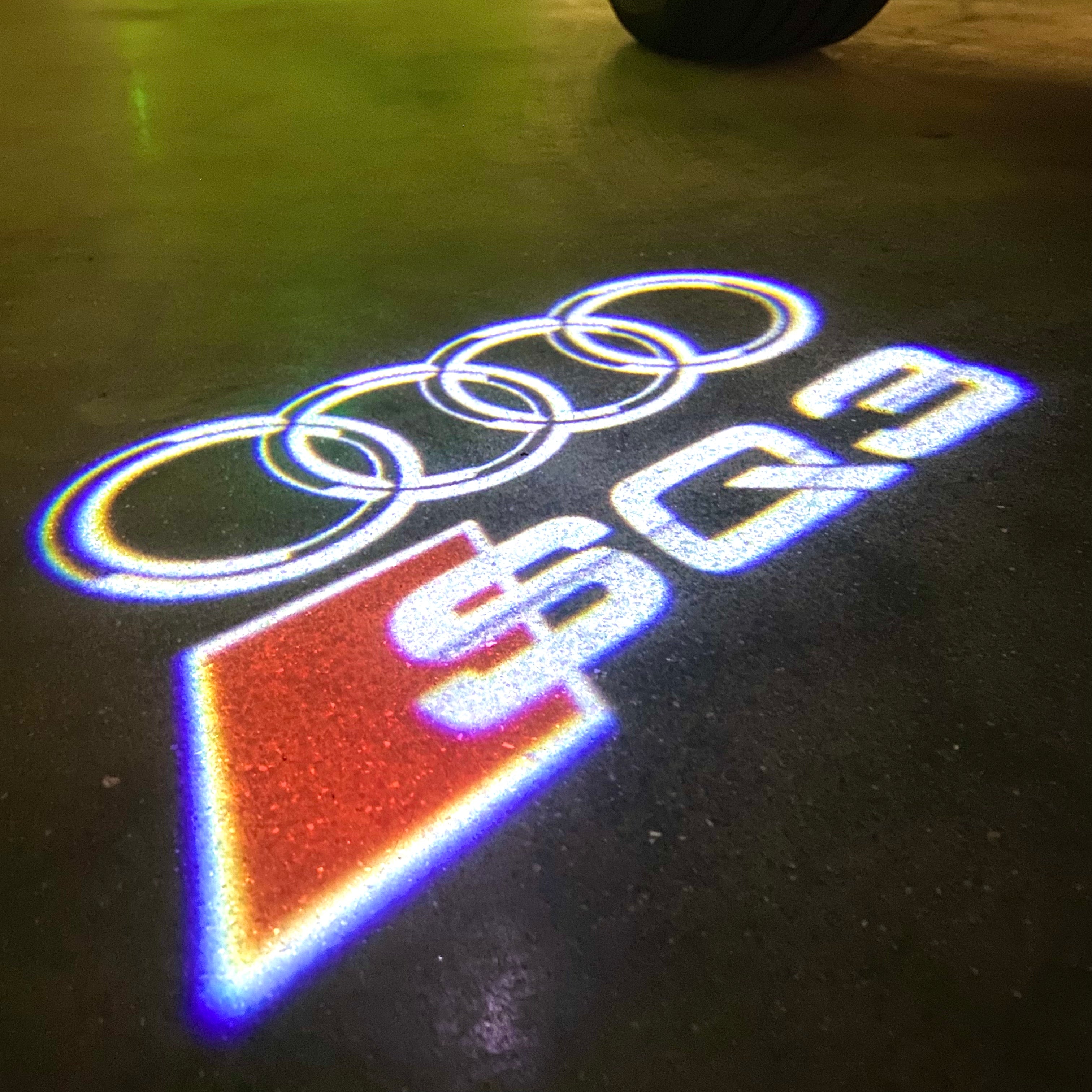 AUDI LOGO PROJECTOT LIGHTS Nr.120 (الكمية 1 = 2 Logo Films /2 أضواء الباب)
