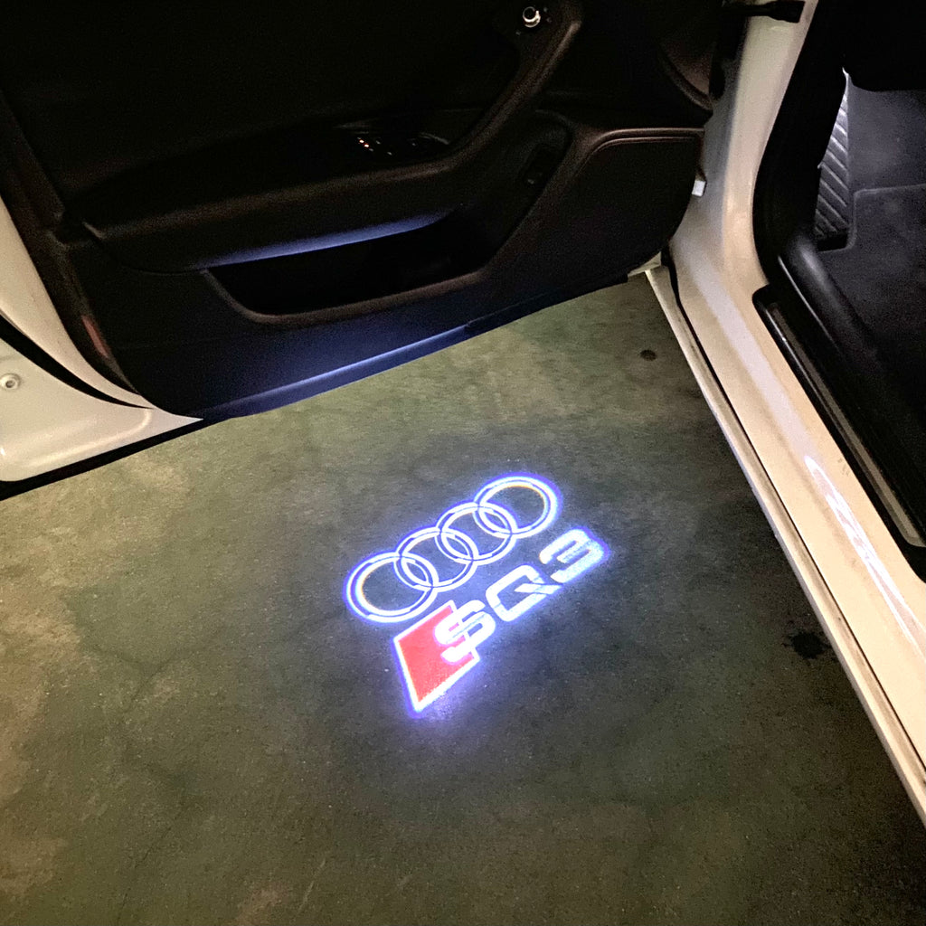 AUDI LOGO PROJECTOT LIGHTS Nr.120 (quantité 1 = 2 Logo Films /2 feux de porte)