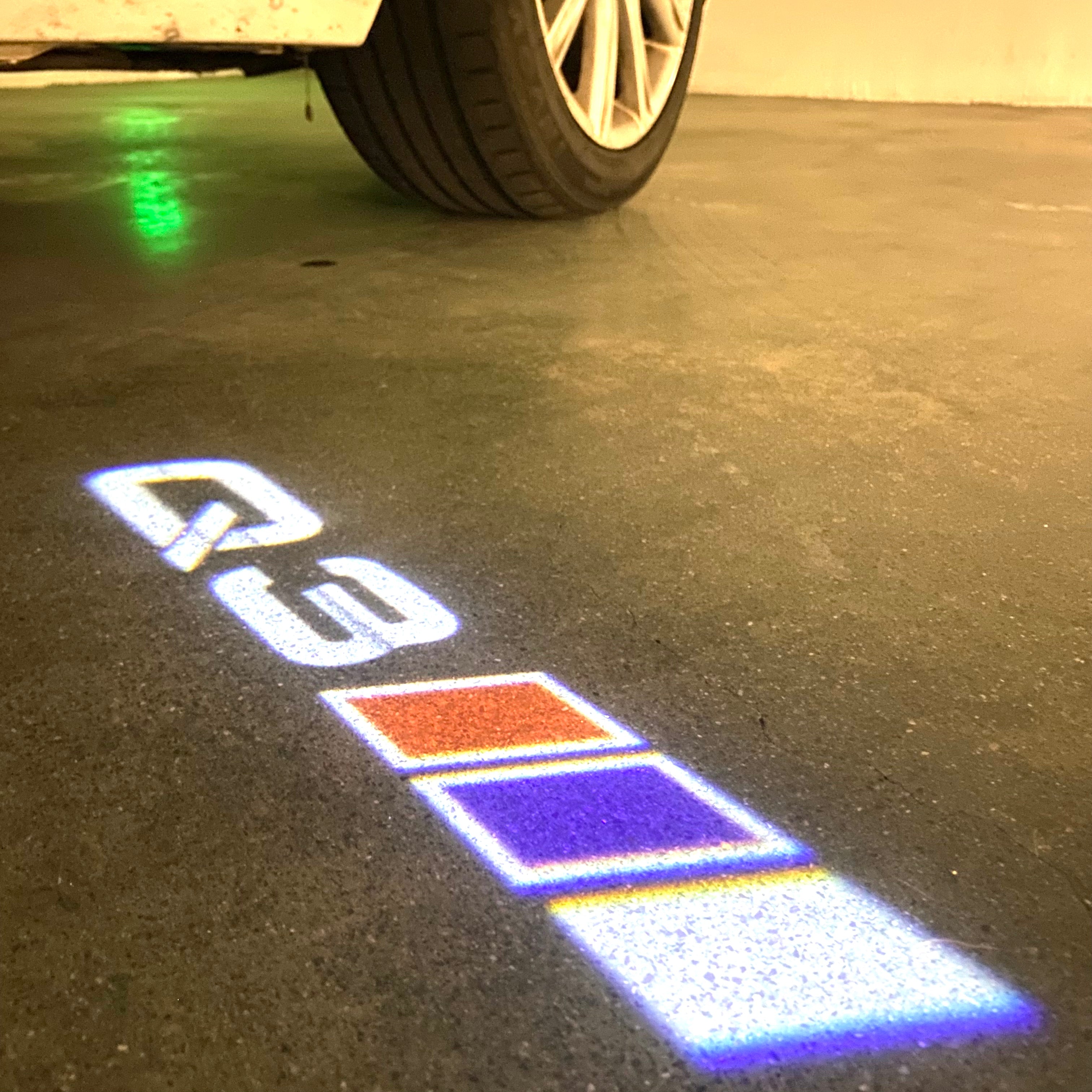 AUDI LOGO PROJECTOT LIGHTS Nr.120 (الكمية 1 = 2 Logo Films /2 أضواء الباب)