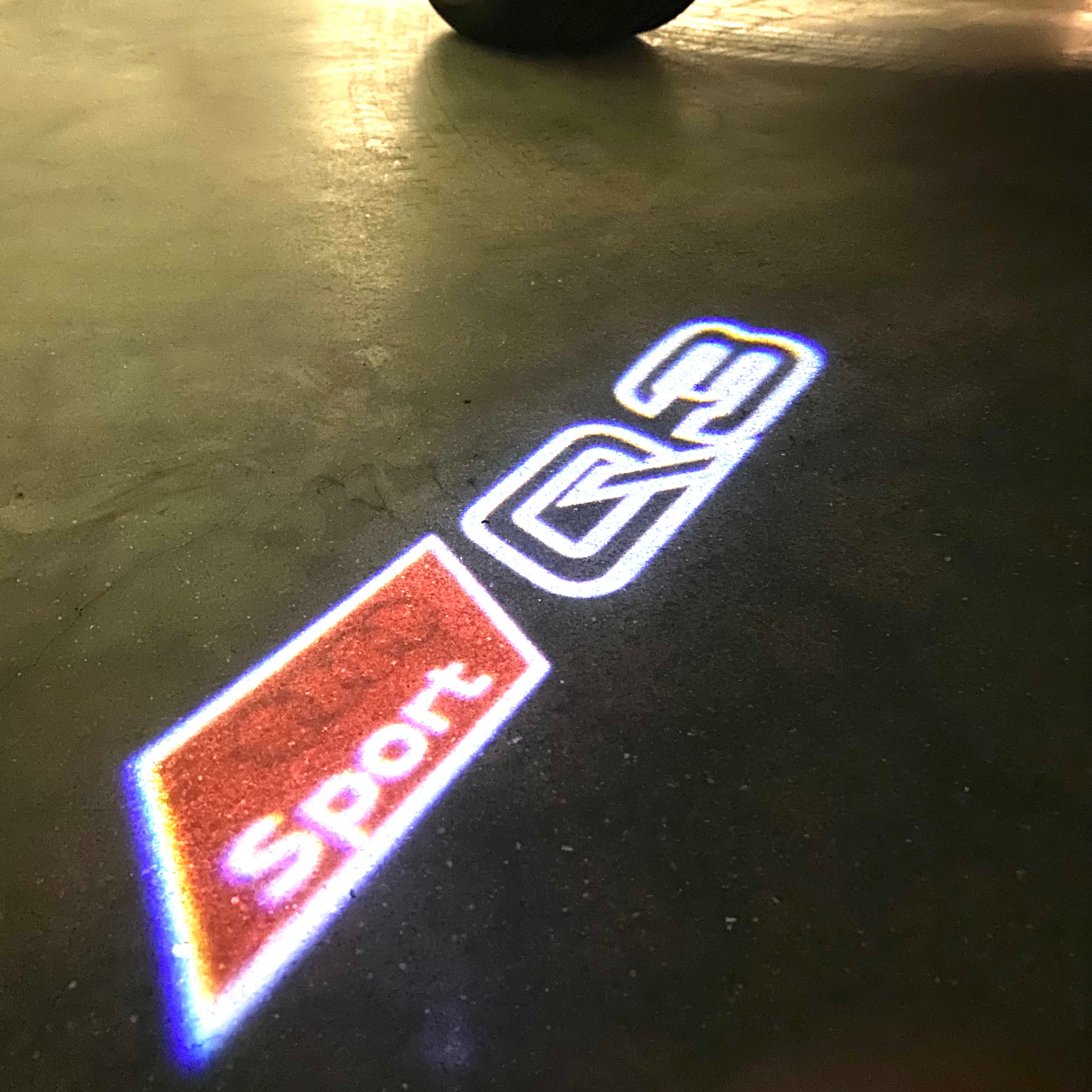AUDI LOGO PROJECTOT LIGHTS Nr.120 (الكمية 1 = 2 Logo Films /2 أضواء الباب)