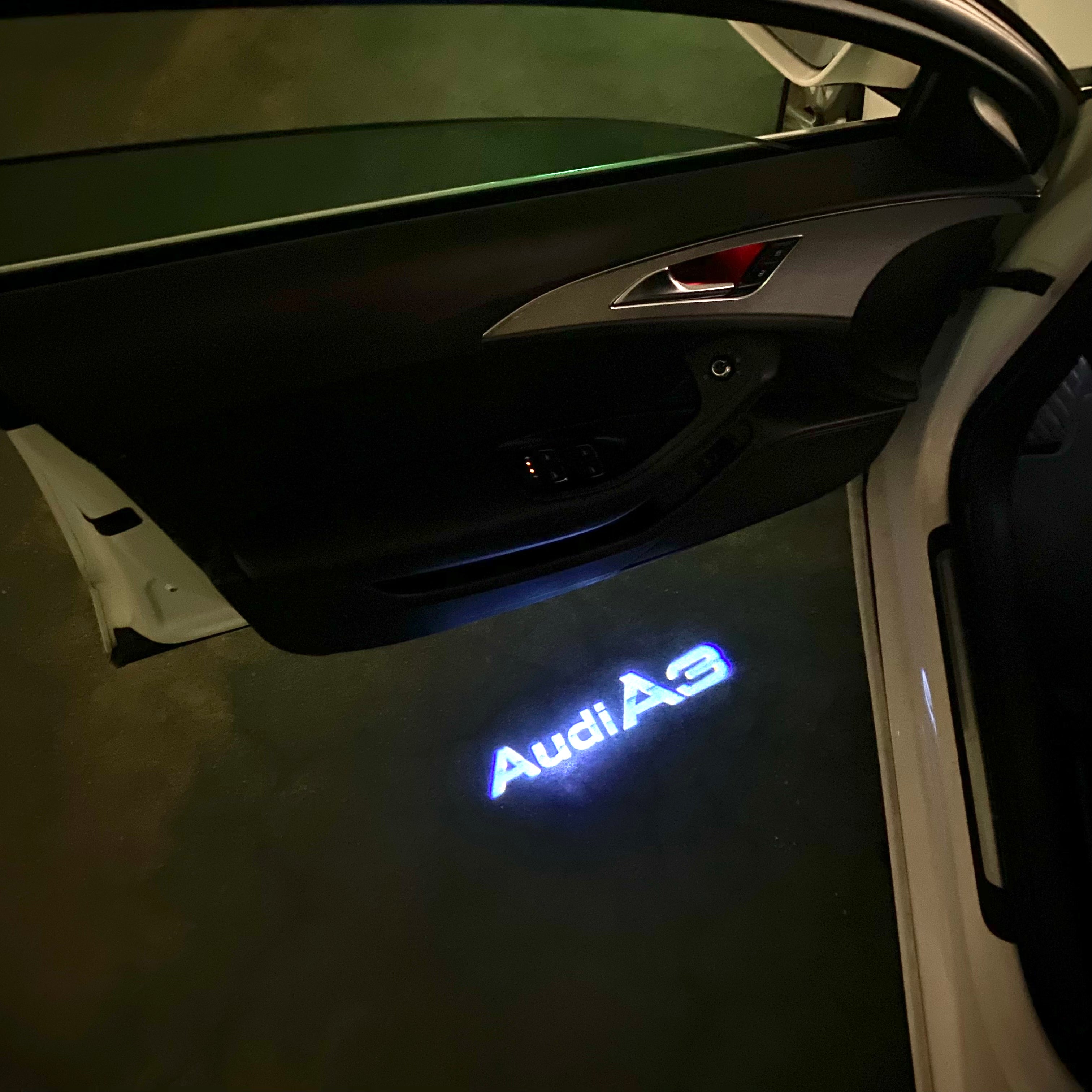 AUDI LOGO PROJECTOT LIGHTS Nr.120 (الكمية 1 = 2 Logo Films /2 أضواء الباب)