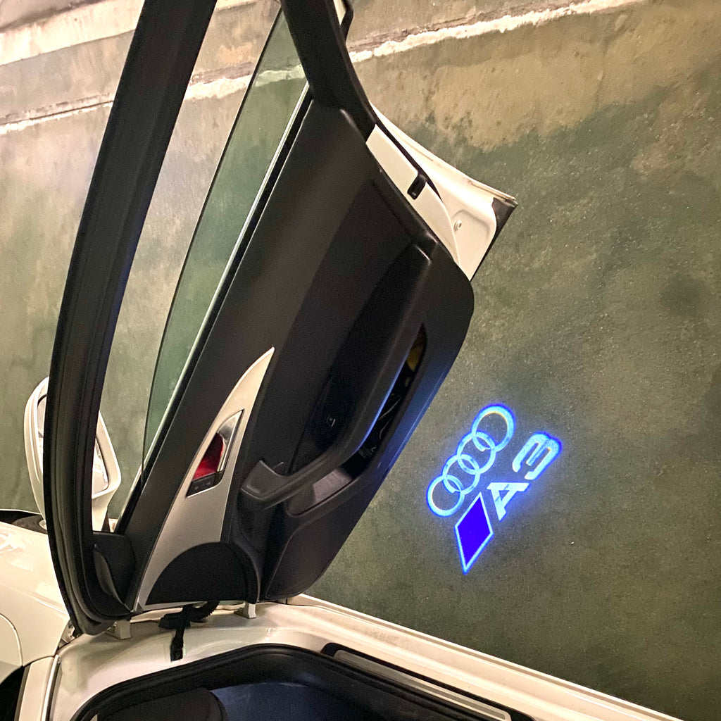 AUDI LOGO PROJECTOT LIGHTS Nr.120 (quantité 1 = 2 Logo Films /2 feux de porte)