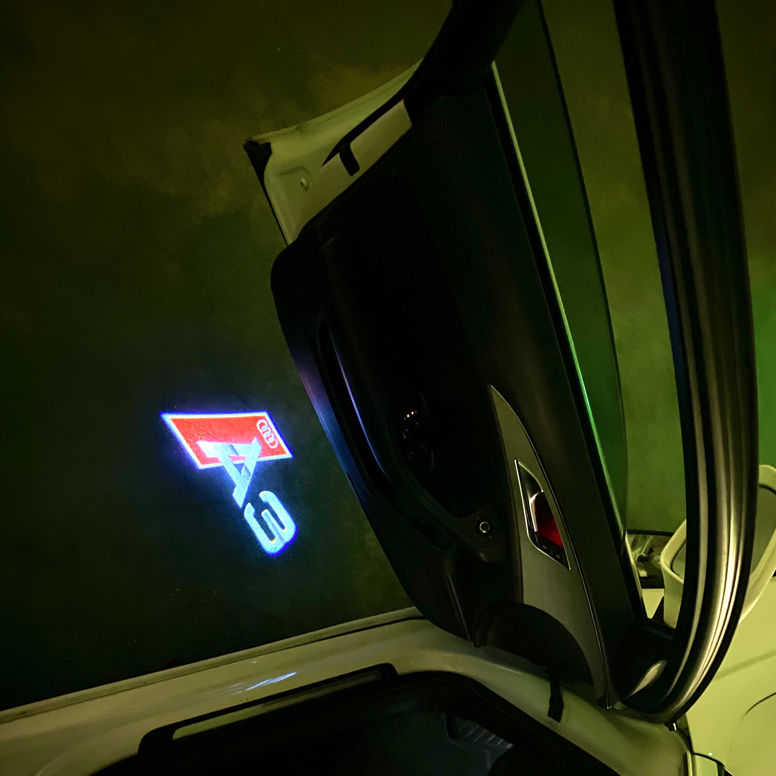 AUDI LOGO PROJECTOT LIGHTS Nr.120 (الكمية 1 = 2 Logo Films /2 أضواء الباب)