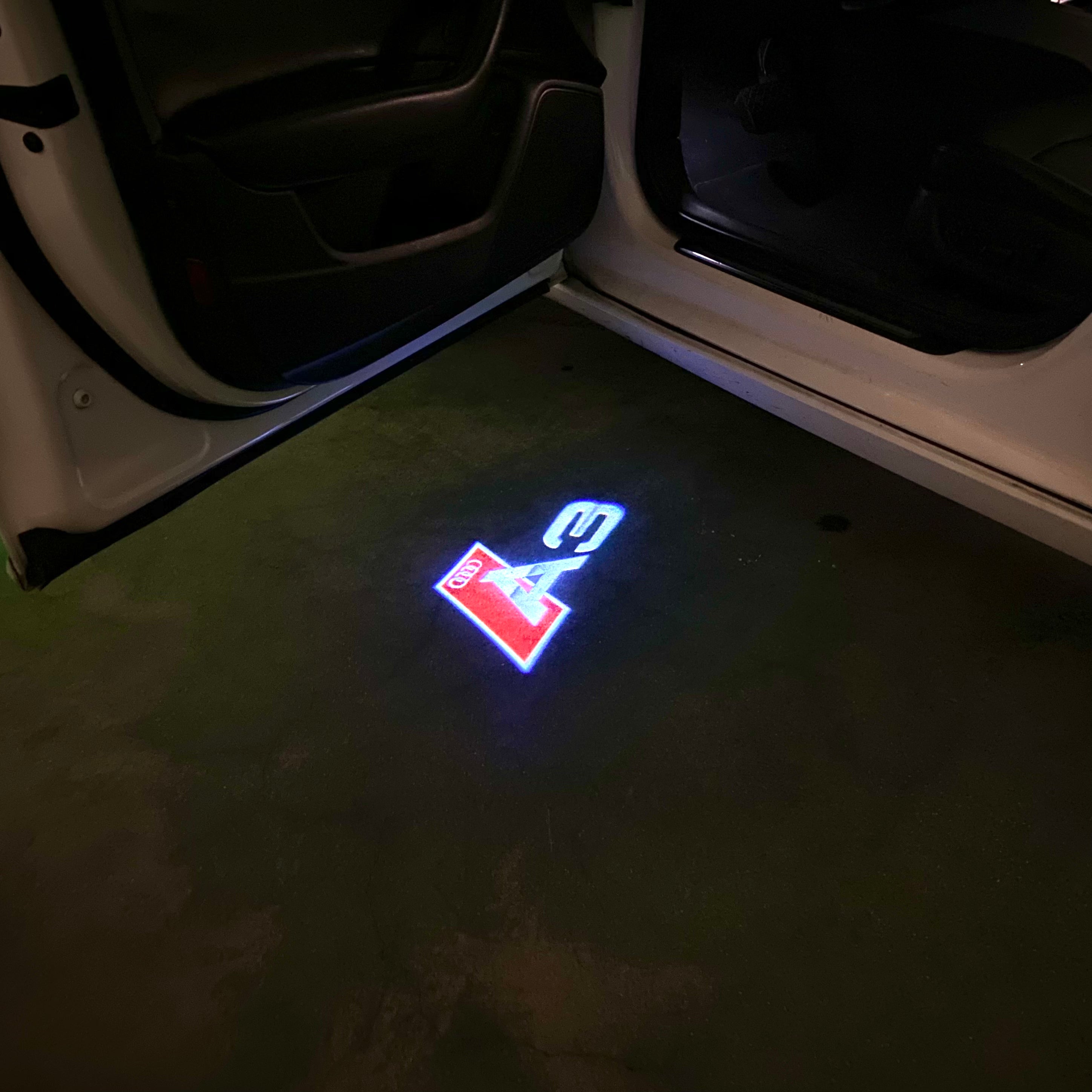 AUDI LOGO PROJECTOT LIGHTS Nr.120 (الكمية 1 = 2 Logo Films /2 أضواء الباب)