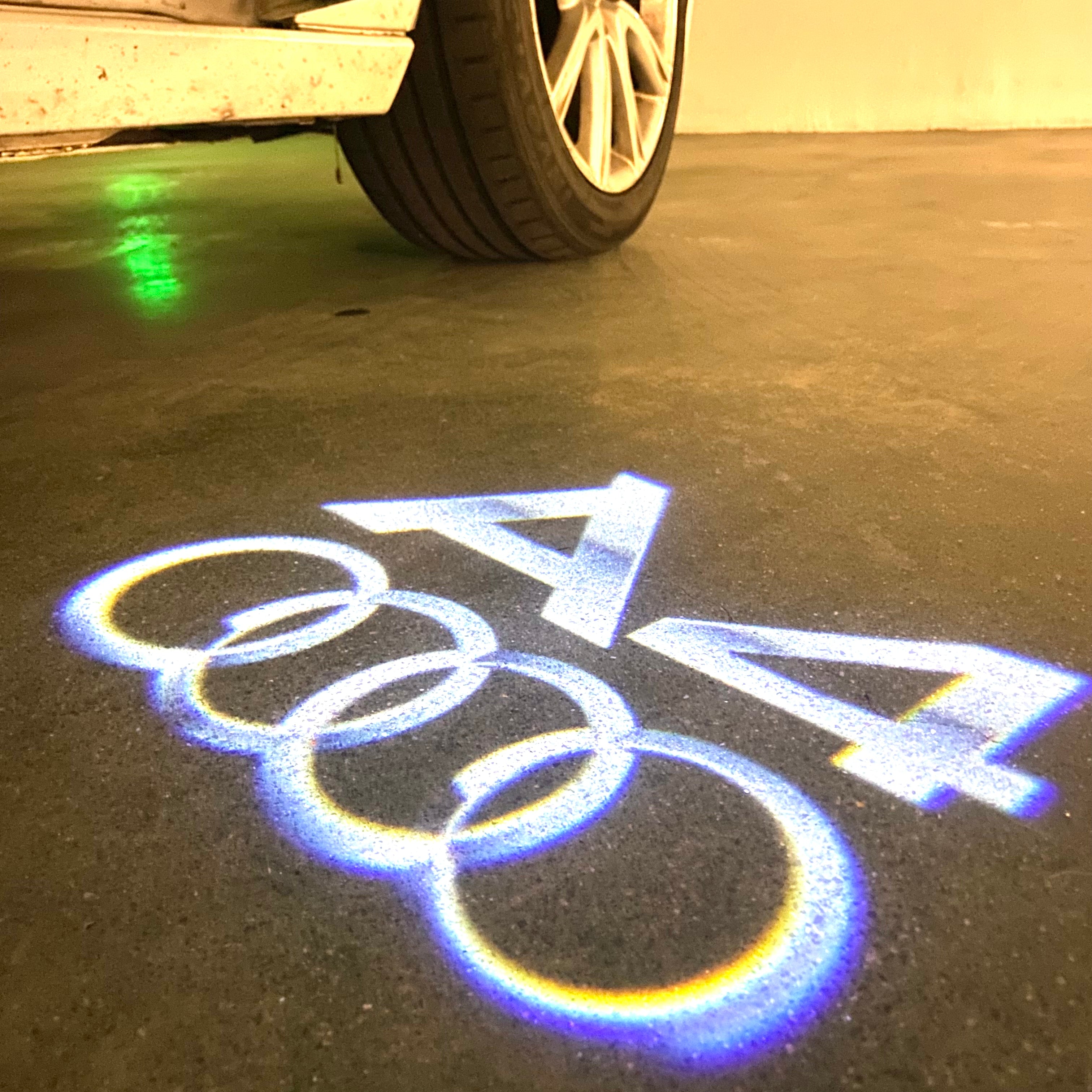 AUDI LOGO PROJECTOT LIGHTS Nr.120 (الكمية 1 = 2 Logo Films /2 أضواء الباب)