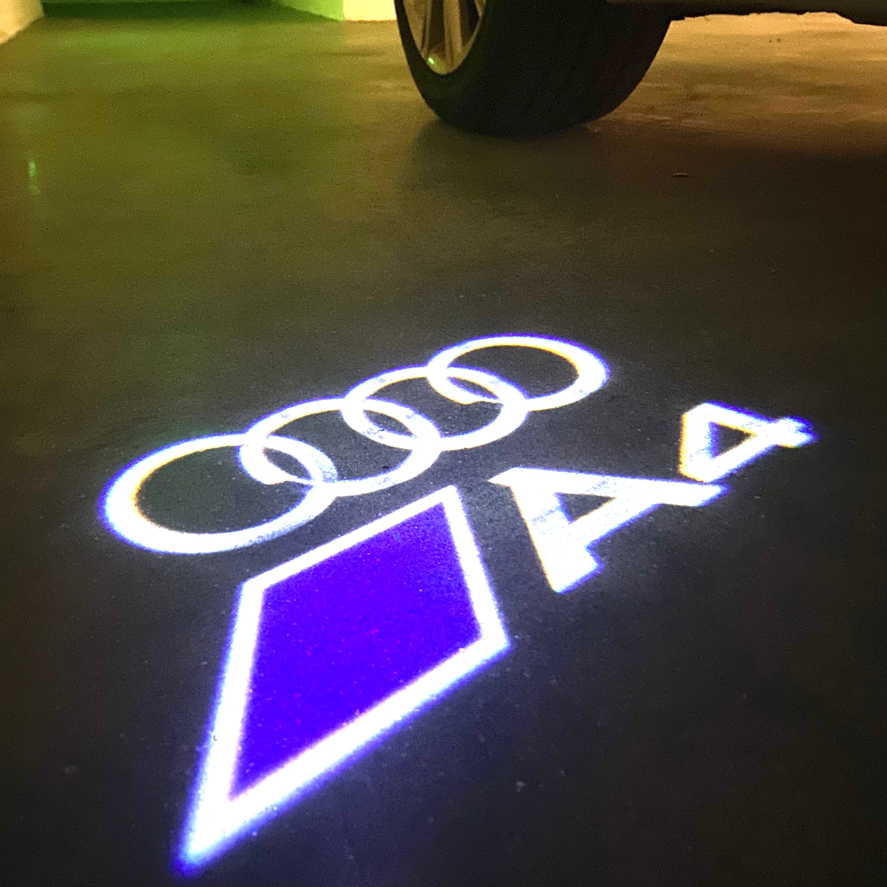 AUDI LOGO PROJECTOT LIGHTS Nr.120 (الكمية 1 = 2 Logo Films /2 أضواء الباب)