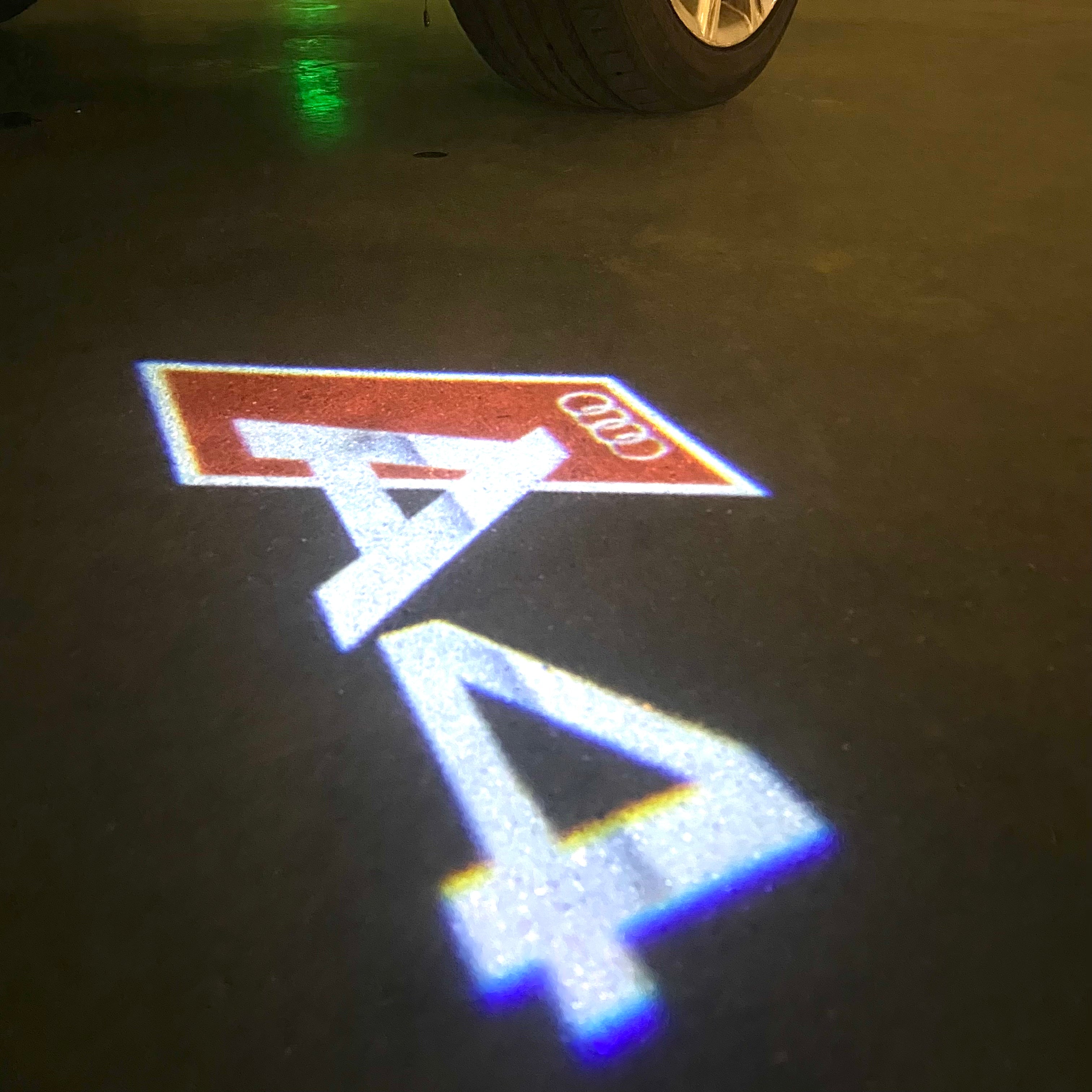 AUDI LOGO PROJECTOT LIGHTS Nr.120 (الكمية 1 = 2 Logo Films /2 أضواء الباب)