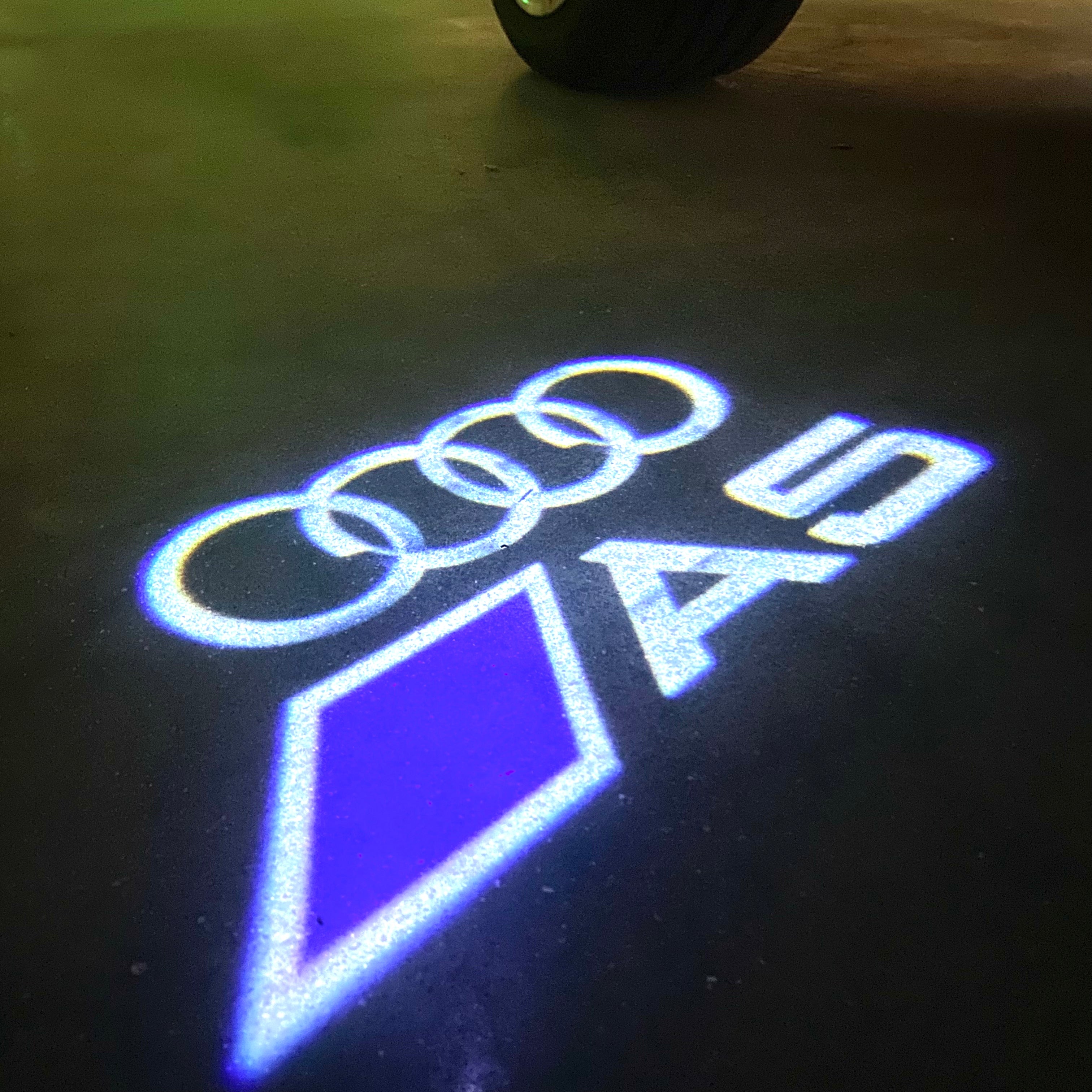 AUDI LOGO PROJECTOT LIGHTS Nr.120 (الكمية 1 = 2 Logo Films /2 أضواء الباب)