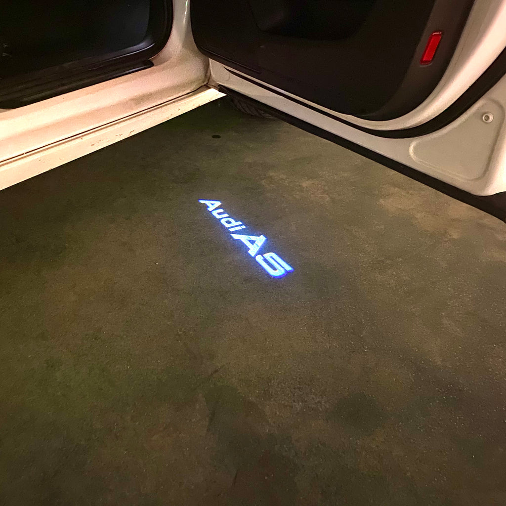 AUDI LOGO PROJECTOT LIGHTS Nr.120 (quantité 1 = 2 Logo Films /2 feux de porte)