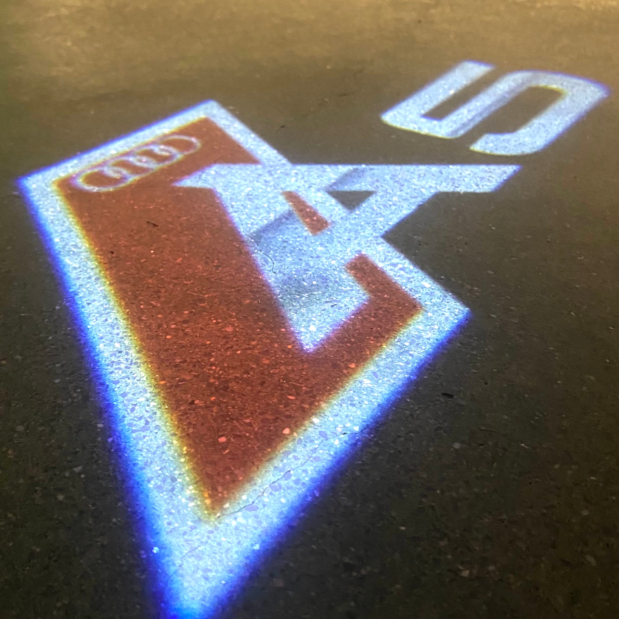 AUDI LOGO PROJECTOT LIGHTS Nr.120 (الكمية 1 = 2 Logo Films /2 أضواء الباب)