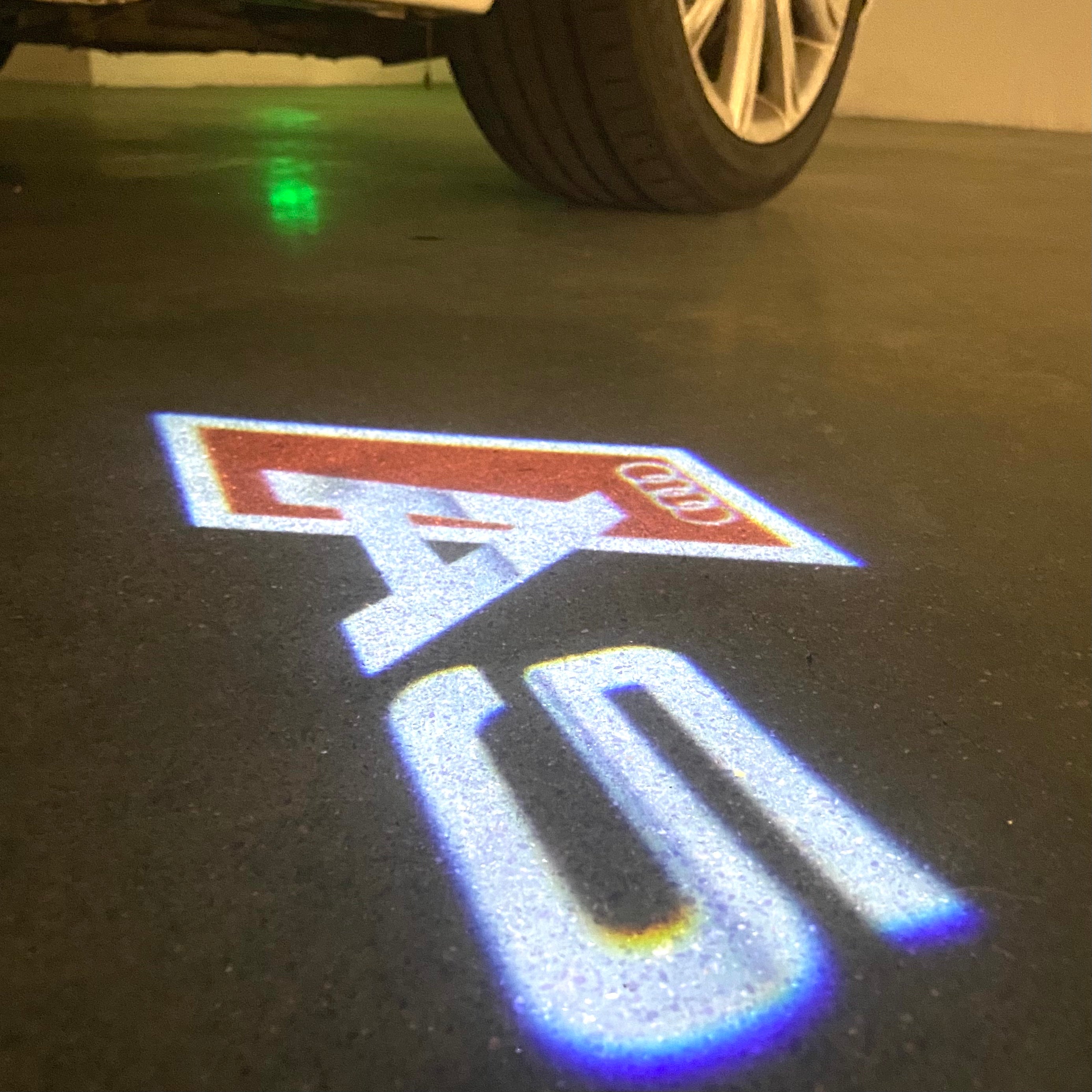AUDI LOGO PROJECTOT LIGHTS Nr.120 (الكمية 1 = 2 Logo Films /2 أضواء الباب)