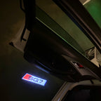 AUDI LOGO PROJECTOT LIGHTS Nr.120 (الكمية 1 = 2 Logo Films /2 أضواء الباب)