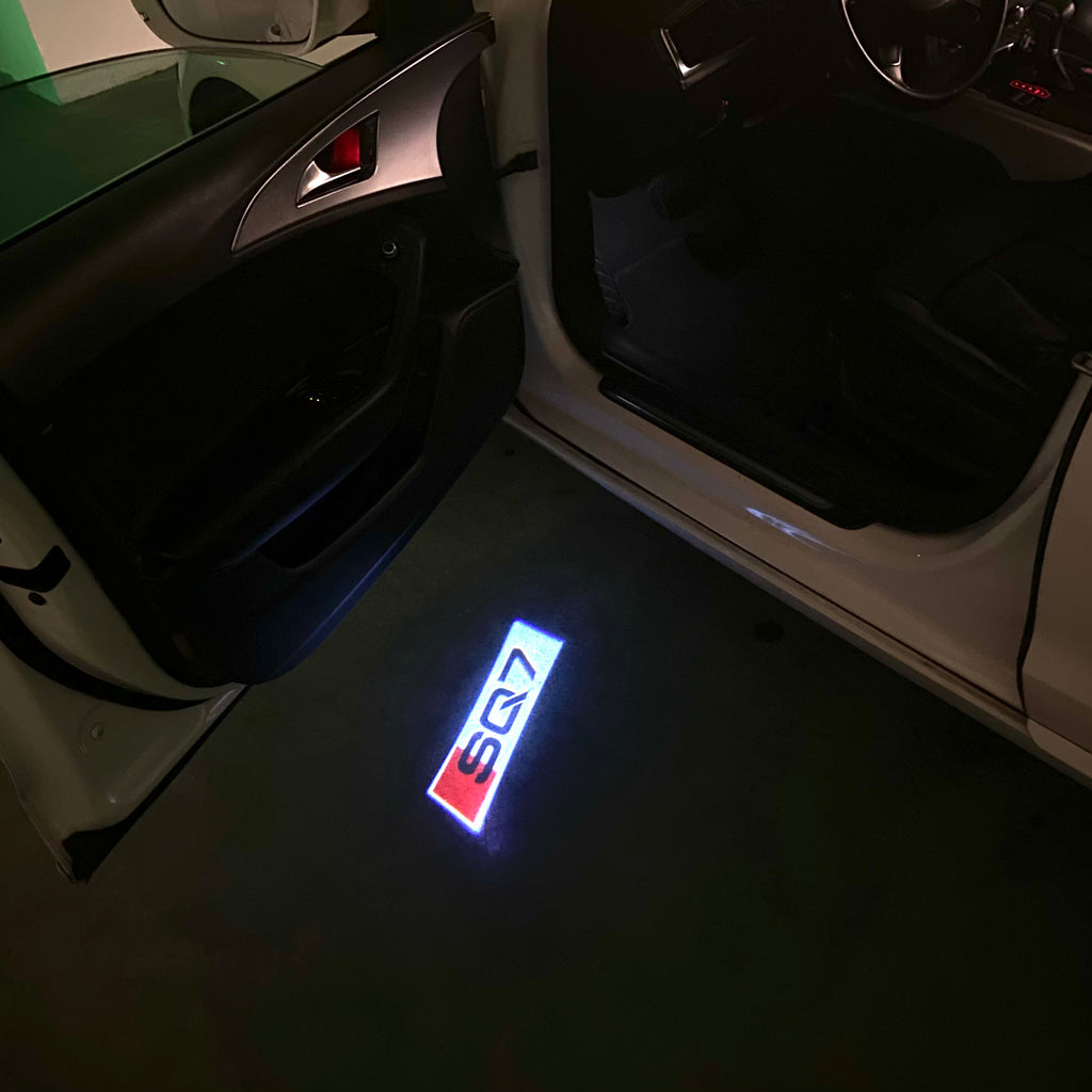 AUDI LOGO PROJECTOT LIGHTS Nr.120 (الكمية 1 = 2 Logo Films /2 أضواء الباب)