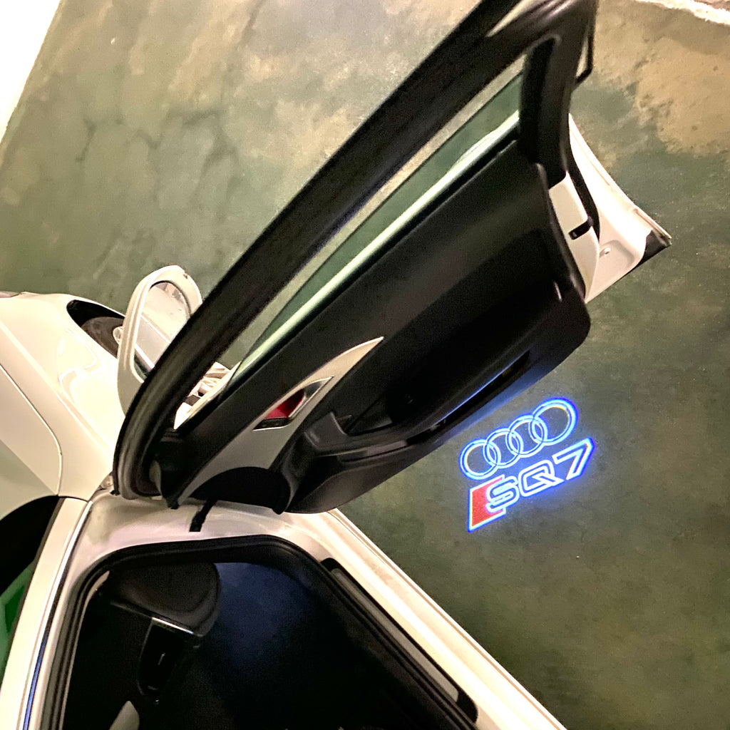 AUDI LOGO PROJECTOT LIGHTS Nr.120 (الكمية 1 = 2 Logo Films /2 أضواء الباب)