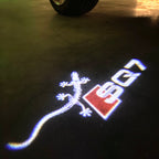 AUDI LOGO PROJECTOT LIGHTS Nr.120 (الكمية 1 = 2 Logo Films /2 أضواء الباب)