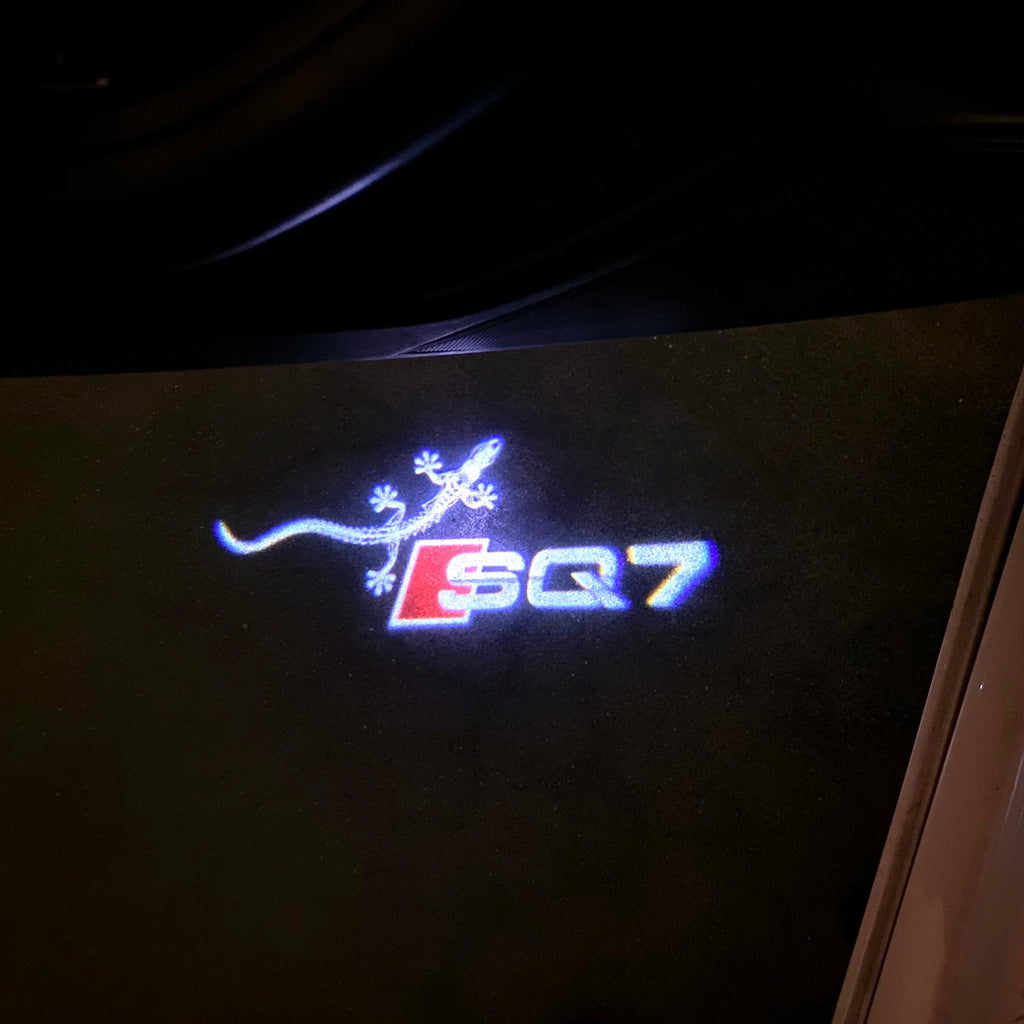 AUDI LOGO PROJECTOT LIGHTS Nr.120 (الكمية 1 = 2 Logo Films /2 أضواء الباب)