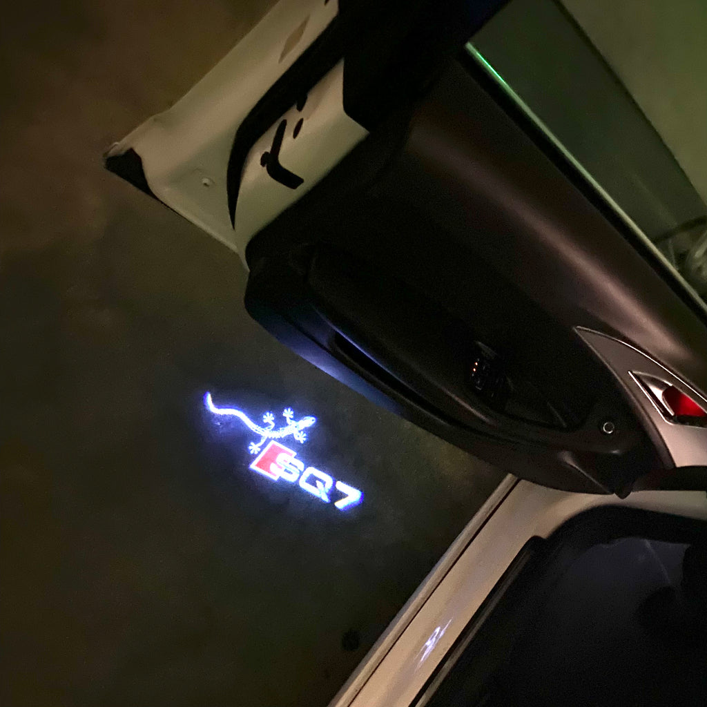 AUDI LOGO PROJECTOT LIGHTS Nr.120 (الكمية 1 = 2 Logo Films /2 أضواء الباب)