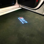 LUCES DE PROYECTOR LOGO AUDI No 120 (cantidad 1 = 2 películas con logotipo / 2 luces de puerta)