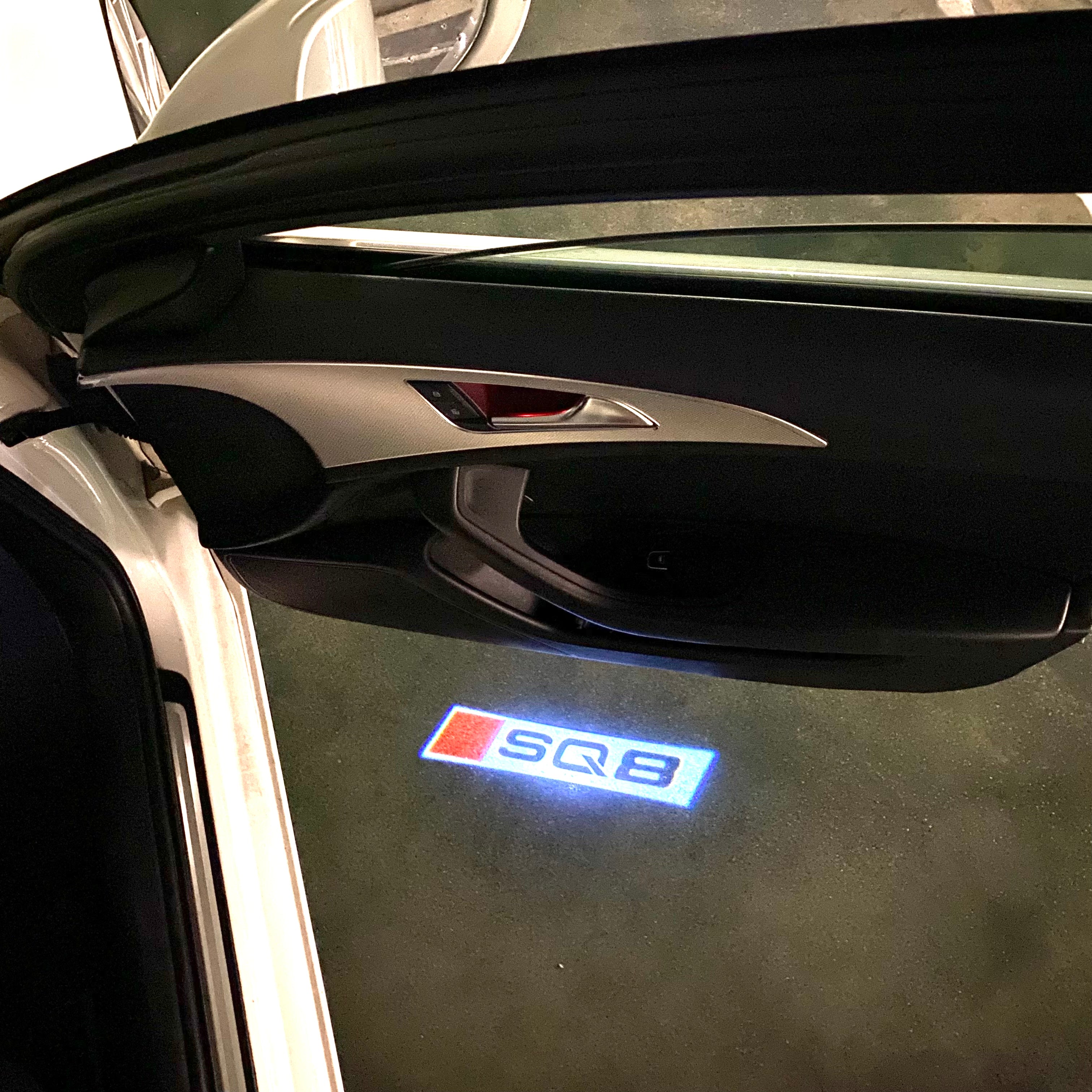 AUDI LOGO PROJECTOT LIGHTS Nr.120 (الكمية 1 = 2 Logo Films /2 أضواء الباب)
