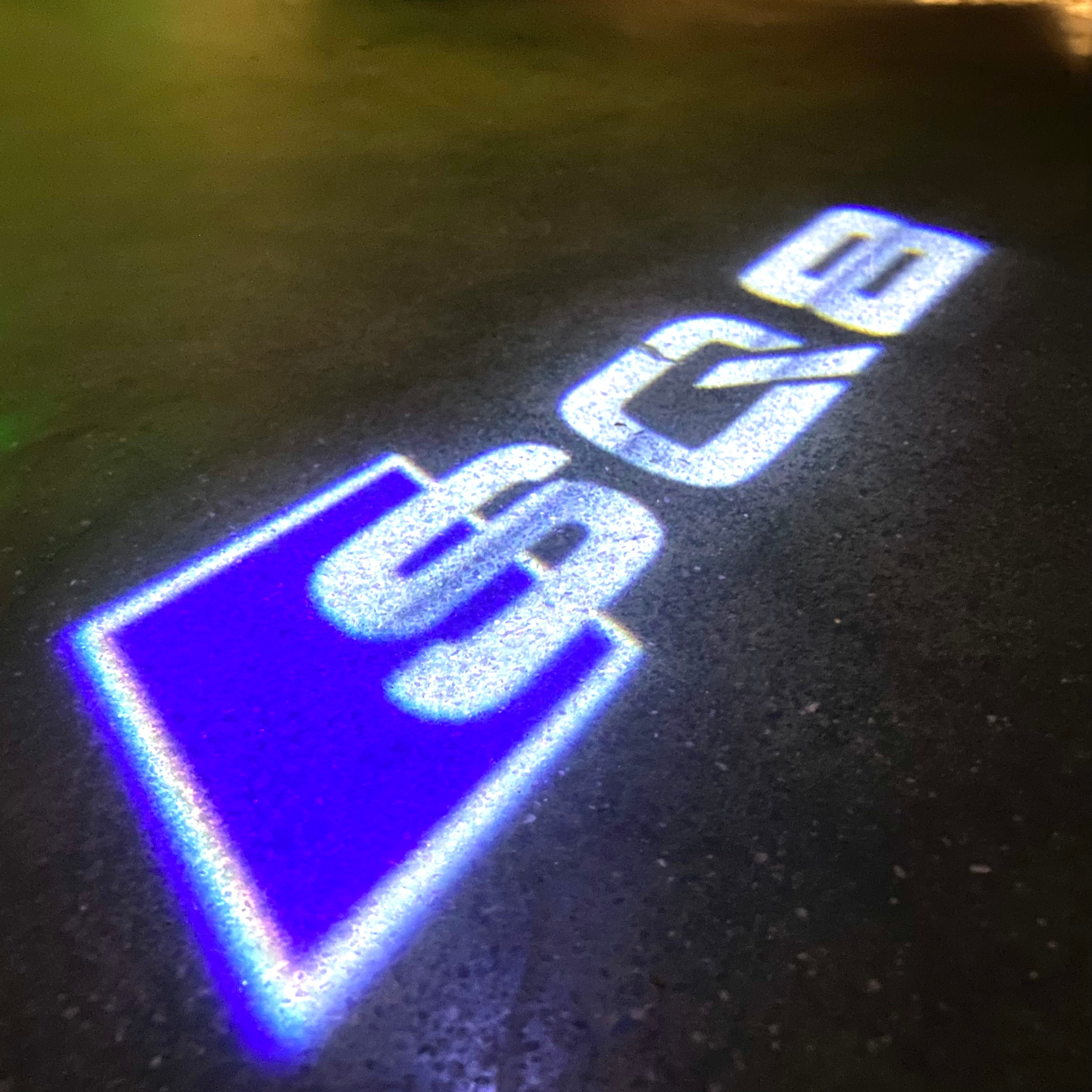 AUDI LOGO PROJECTOT LIGHTS Nr.120 (الكمية 1 = 2 Logo Films /2 أضواء الباب)