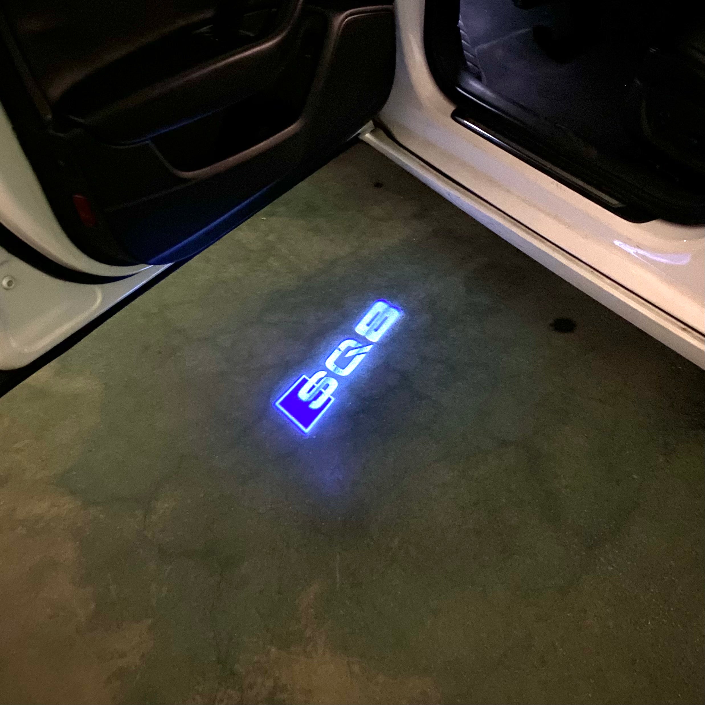 AUDI LOGO PROJECTOT LIGHTS Nr.120 (الكمية 1 = 2 Logo Films /2 أضواء الباب)