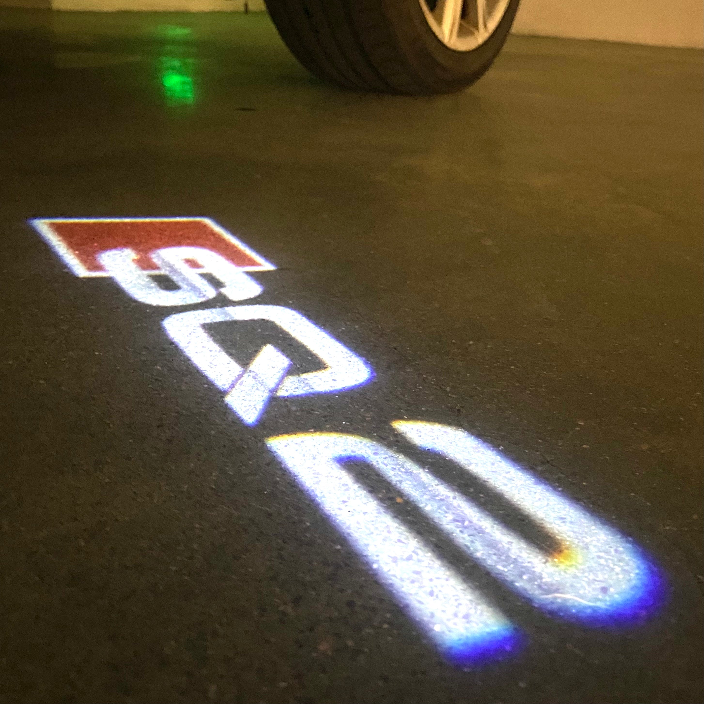 AUDI LOGO PROJECTOT LIGHTS Nr.120 (الكمية 1 = 2 Logo Films /2 أضواء الباب)