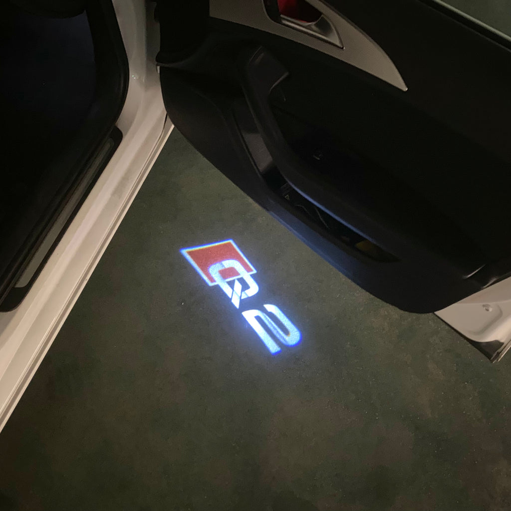 AUDI LOGO PROJECTOT LIGHTS Nr.120 (quantité 1 = 2 Logo Films /2 feux de porte)