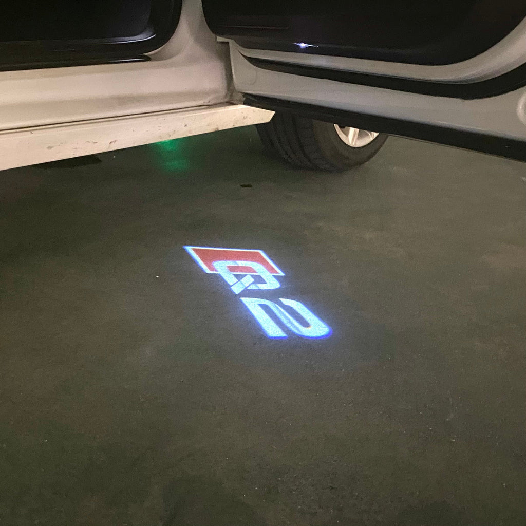 AUDI LOGO PROJECTOT LIGHTS Nr.120 (quantité 1 = 2 Logo Films /2 feux de porte)