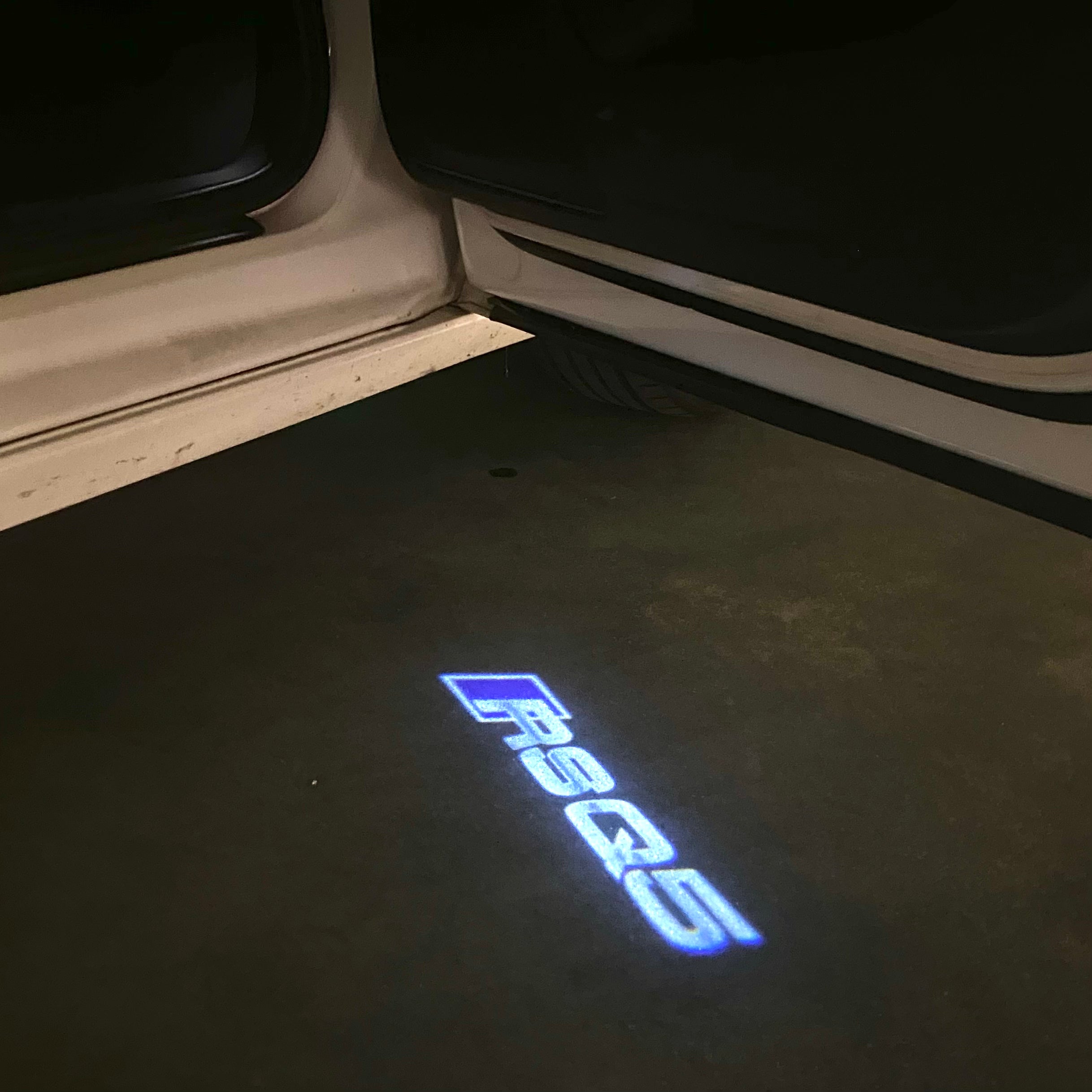 AUDI LOGO PROJECTOT LIGHTS Nr.120 (الكمية 1 = 2 Logo Films /2 أضواء الباب)
