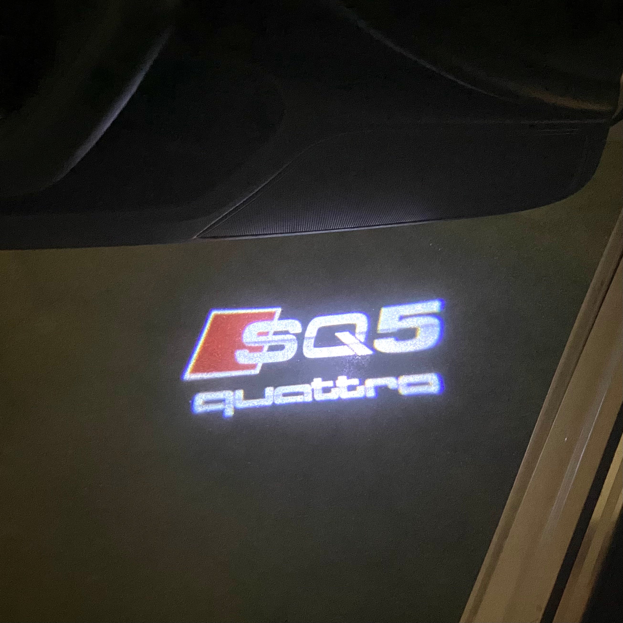 AUDI LOGO PROJECTOT LIGHTS Nr.120 (الكمية 1 = 2 Logo Films /2 أضواء الباب)