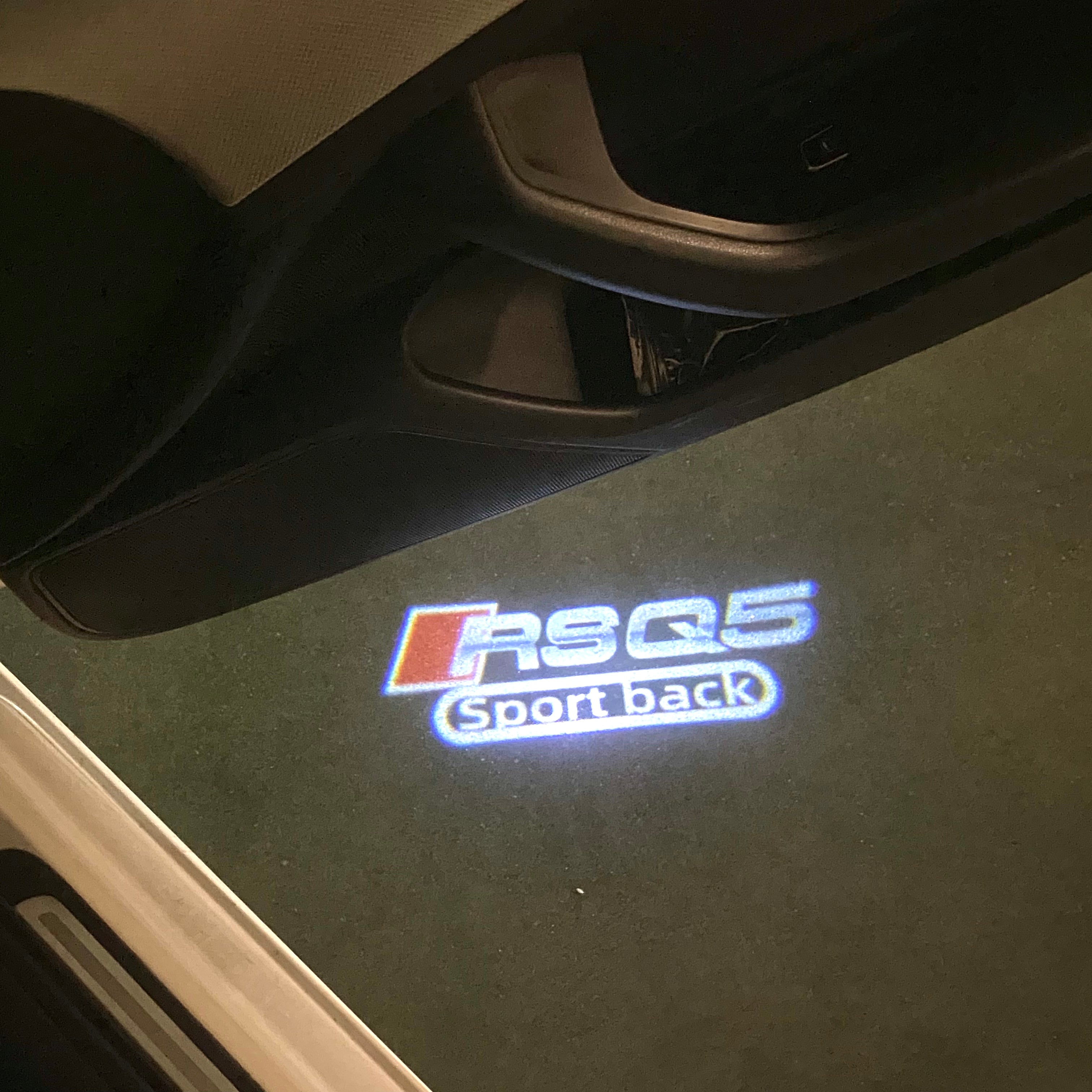 AUDI LOGO PROJECTOT LIGHTS Nr.120 (الكمية 1 = 2 Logo Films /2 أضواء الباب)