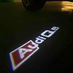 LUCES DE PROYECTOR LOGO AUDI No 120 (cantidad 1 = 2 películas con logotipo / 2 luces de puerta)