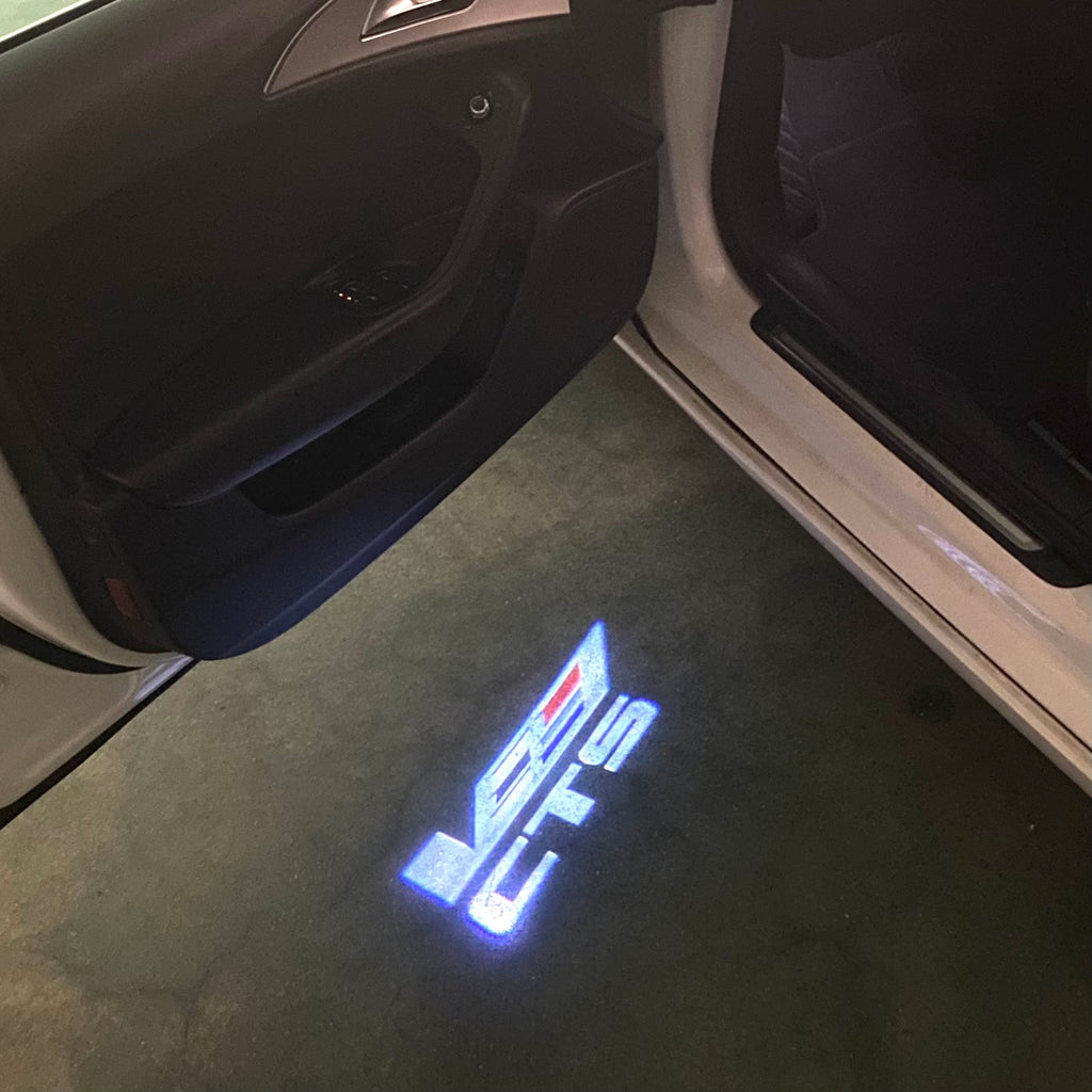 AUDI LOGO PROJECTOT LIGHTS Nr.19 (الكمية 1 = 2 Logo Films /2 أضواء الباب)