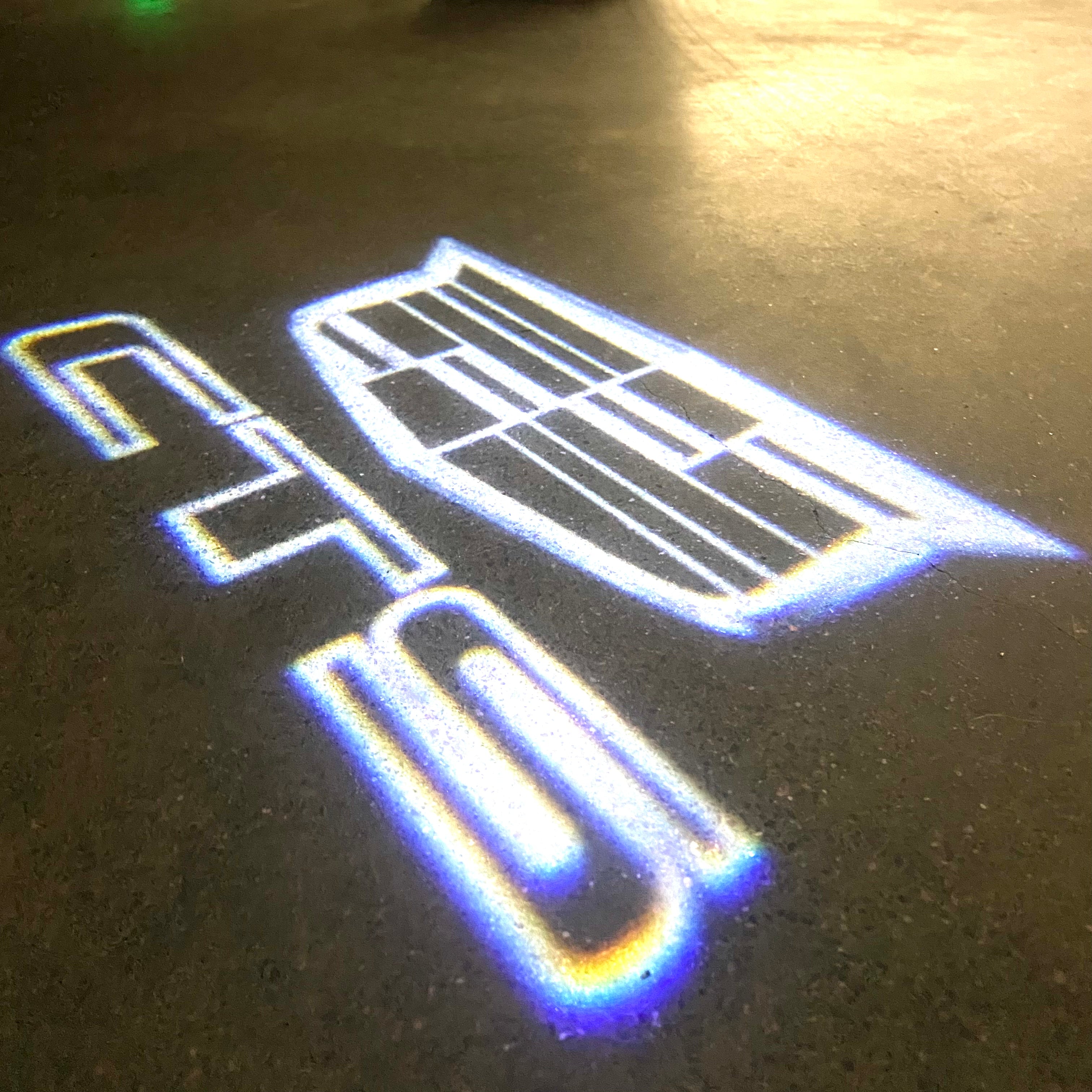 AUDI LOGO PROJECTOT LIGHTS Nr.19 (الكمية 1 = 2 Logo Films /2 أضواء الباب)
