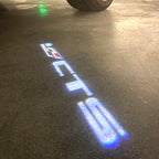 AUDI LOGO PROJECTOT LIGHTS Nr.19 (cantidad 1 = 2 películas con logotipo /2 luces de puerta)