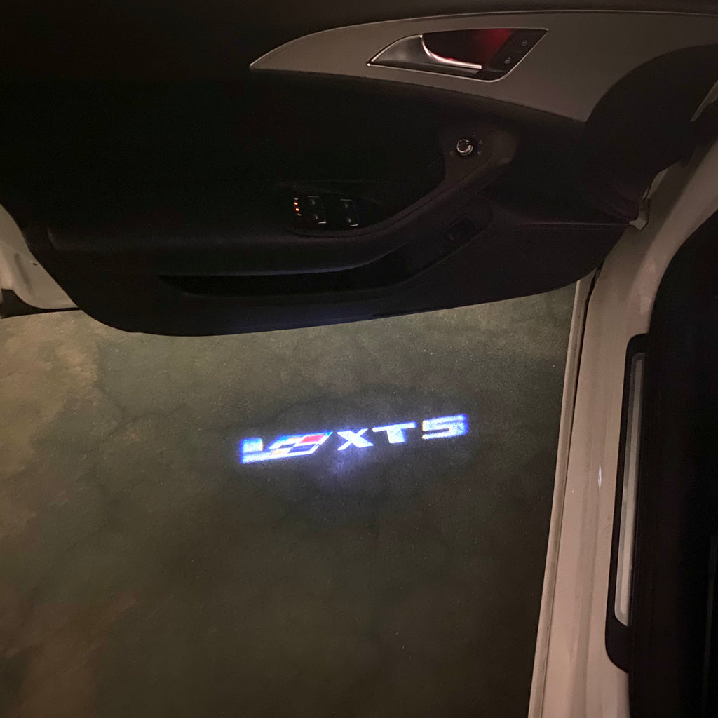 AUDI LOGO PROJECTOT LIGHTS Nr.19 (الكمية 1 = 2 Logo Films /2 أضواء الباب)