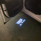 AUDI LOGO PROJECTOT LIGHTS Nr.19 (الكمية 1 = 2 Logo Films /2 أضواء الباب)