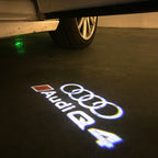 AUDI LOGO PROJECTOT LIGHTS Nr.120 (الكمية 1 = 2 Logo Films /2 أضواء الباب)